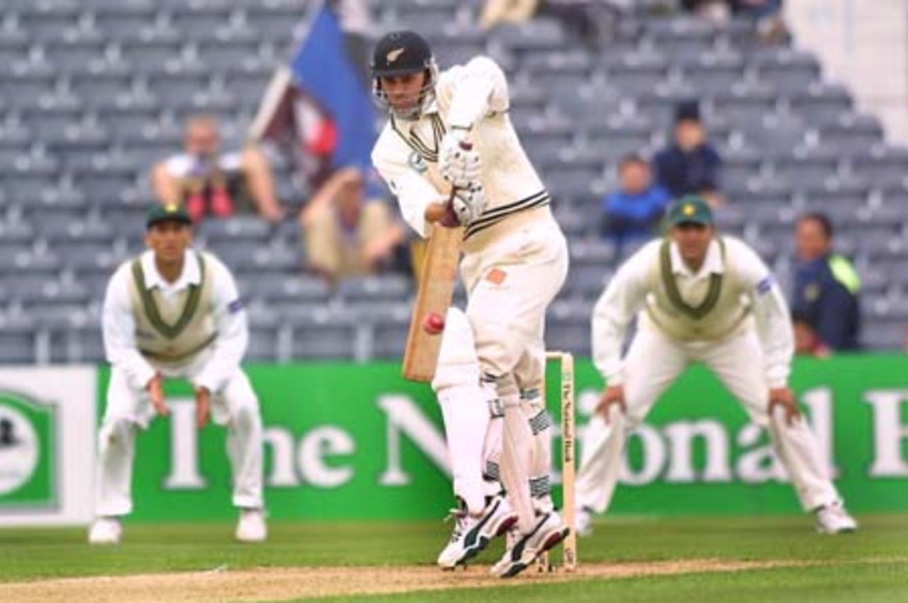 New Zealand batsman Mathew Sinclair jumps on the crease to turn a ball away on the leg side during his first innings of 204 not out. Sinclair became the just second New Zealand batsman to score two Test double centuries after Glenn Turner. Pakistan slip fielders Younis Khan and Inzamam-ul-Haq look on in the background. 2nd Test: New Zealand v Pakistan at Jade Stadium, Christchurch, 15-19 March 2001 (16 March 2001).