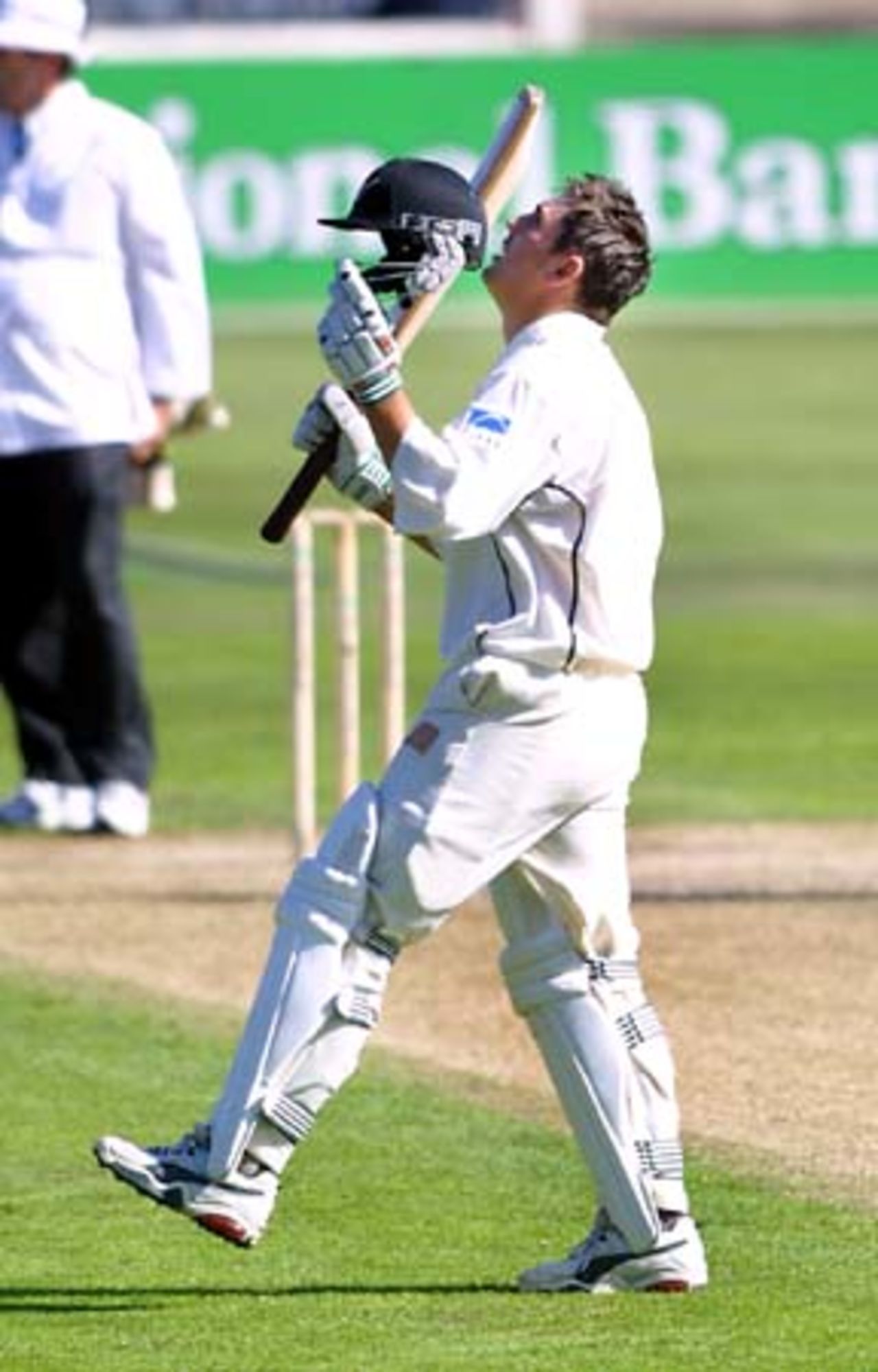 New Zealand batsman Mathew Sinclair looks skyward after kissing his helmet in celebration of reaching his double century. Sinclair became the just second New Zealand batsman to score two Test double centuries after Glenn Turner. Sinclair went on to score 204 not out. 2nd Test: New Zealand v Pakistan at Jade Stadium, Christchurch, 15-19 March 2001 (16 March 2001).