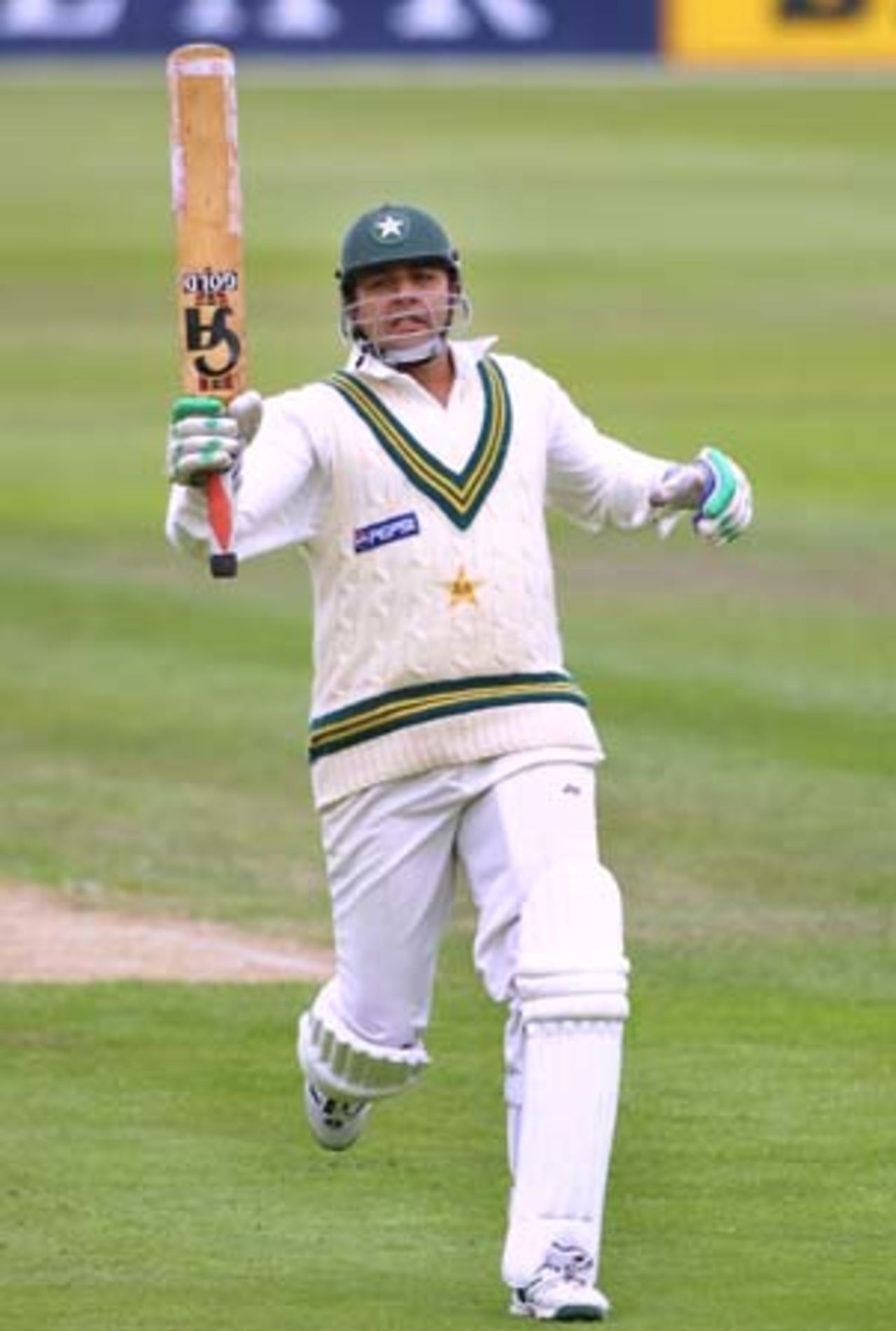 Pakistan batsman Inzamam-ul-Haq raises his bat in celebration of reaching his 13th Test century. Inzamam went on to score 130 in his first innings. 2nd Test: New Zealand v Pakistan at Jade Stadium, Christchurch, 15-19 March 2001 (17 March 2001).