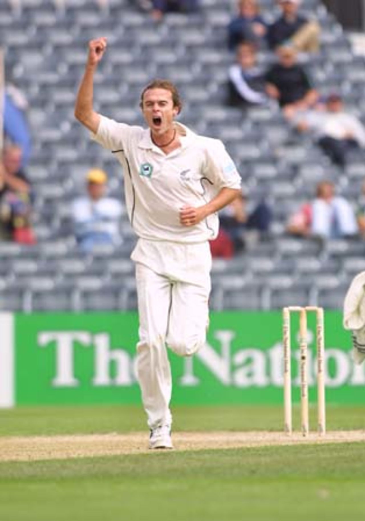 New Zealand fast medium bowler Chris Martin runs down the pitch in celebration of dismissing Pakistan batsman Inzamam-ul-Haq, caught at first slip by Stephen Fleming for 130. 2nd Test: New Zealand v Pakistan at Jade Stadium, Christchurch, 15-19 March 2001 (17 March 2001).