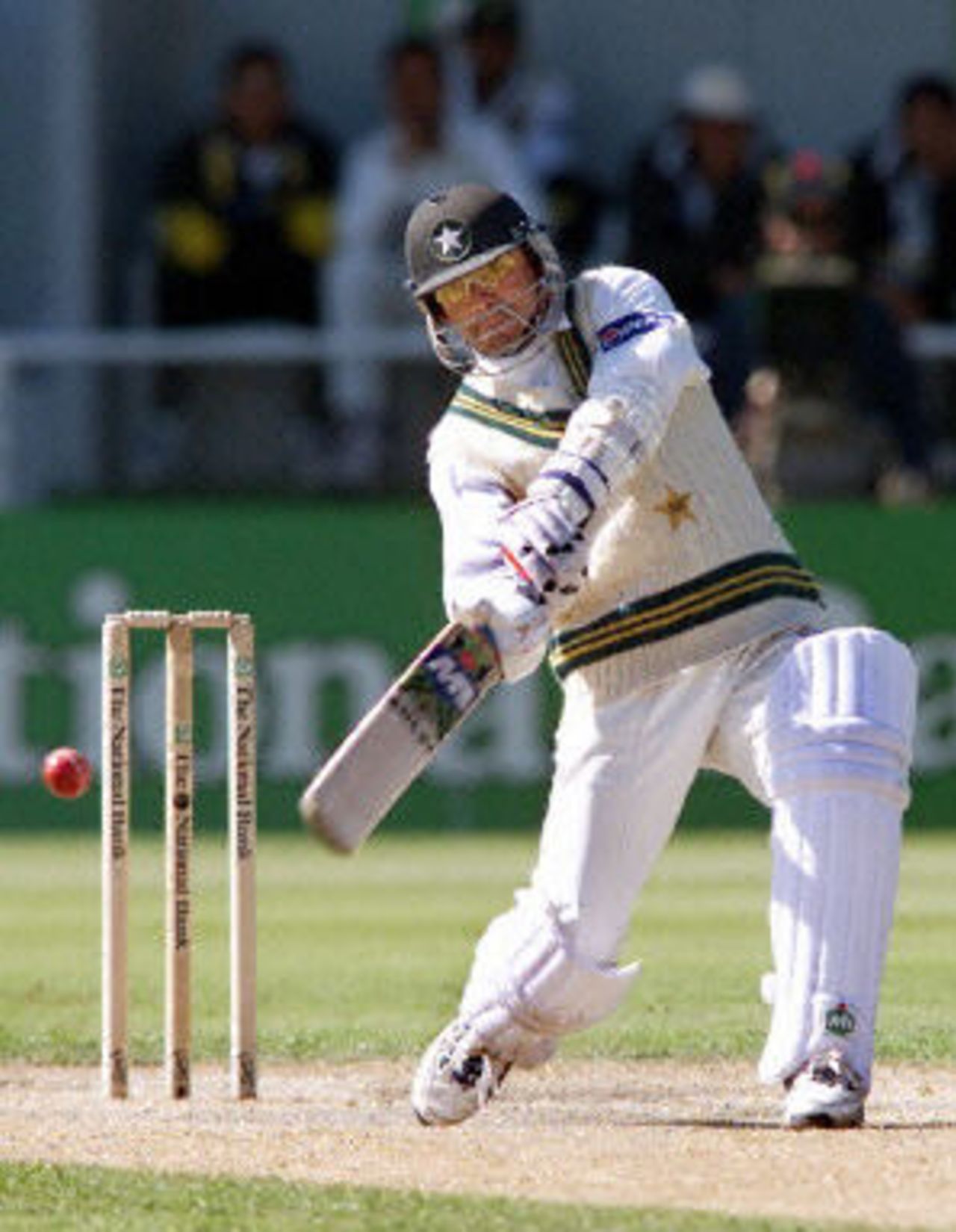 Pakistan batsman Saqlain Mushtaq crashes a ball over the covers on his way to 98 not out, day 4, 2nd Test at Christchurch, 15-19 March 2001.
