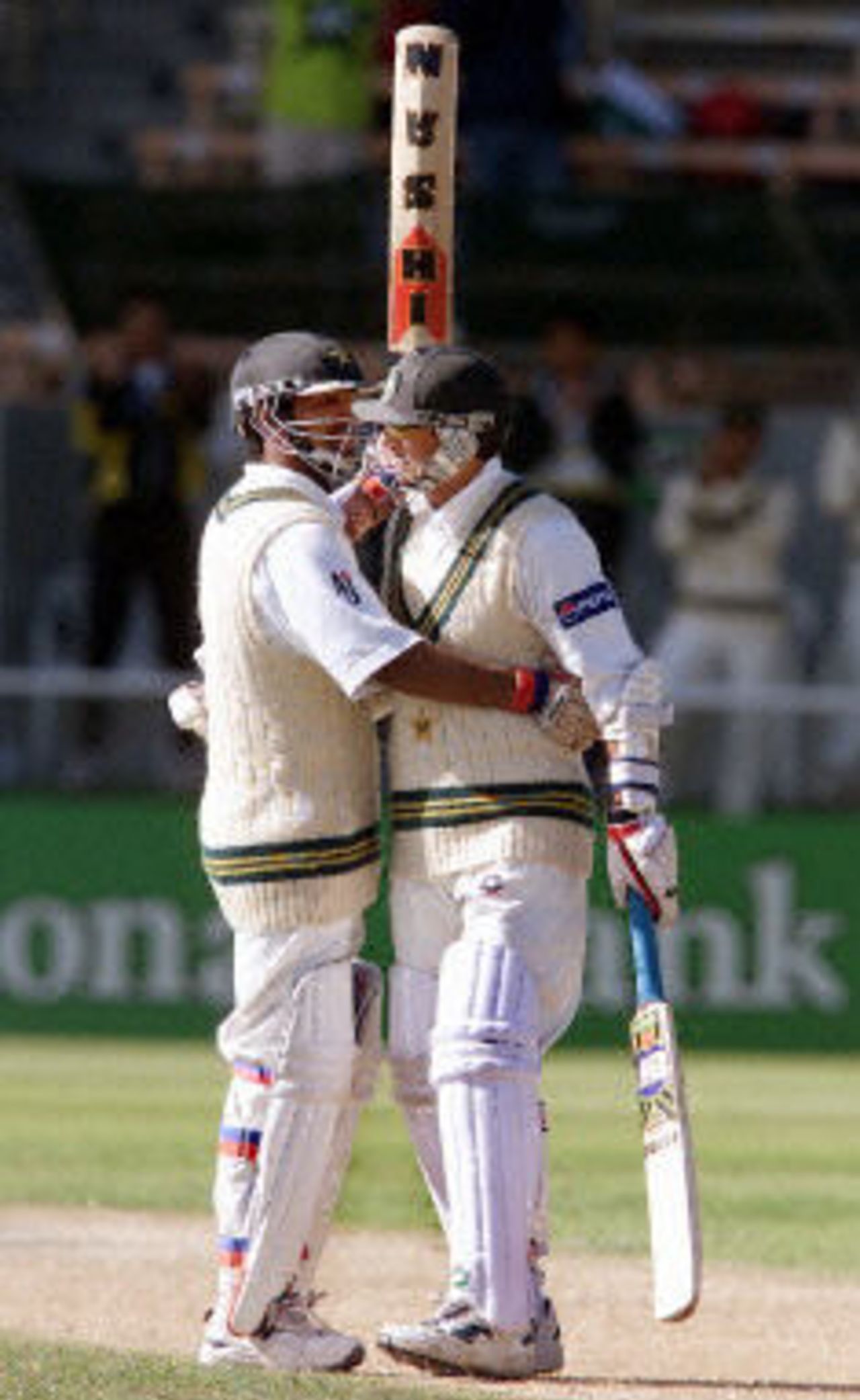 Yousuf Youhana and Saqlain Mushtaq embrace during their marathon partnership, day 4, 2nd Test at Christchurch, 15-19 March 2001.