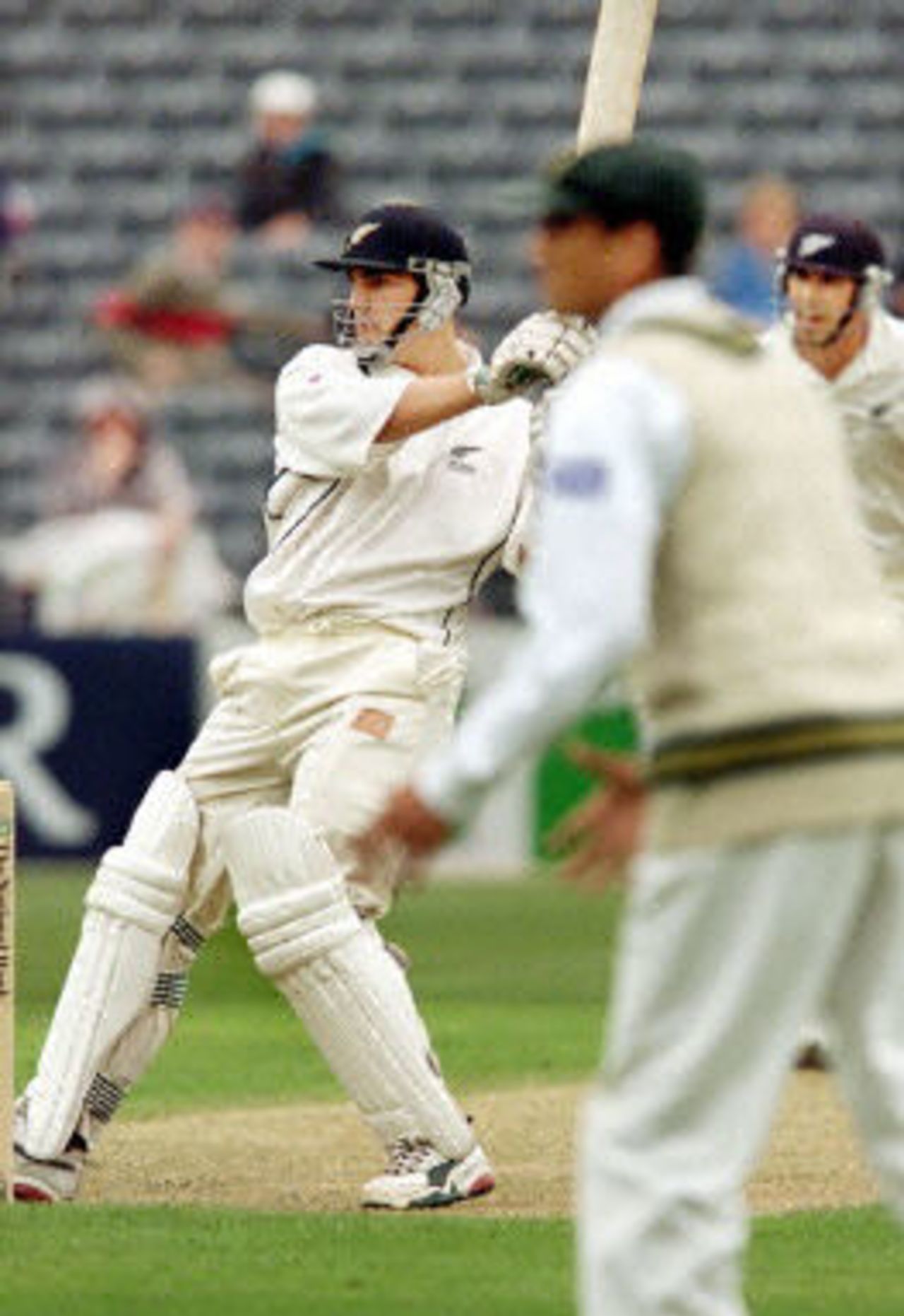 Mathew Sinclair hooks a ball to the boundary on the way to his century as Stephen Fleming and Younis Khan look on, day 1, 2nd Test at Christchurch, 15-19 March 2001.
