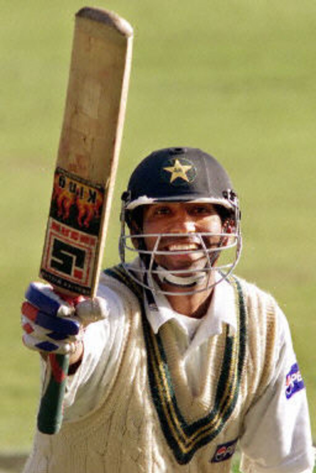 Yousuf Youhana waves to his wife in the crowd after scoring a double century, day 4, 2nd Test at Christchurch, 15-19 March 2001.