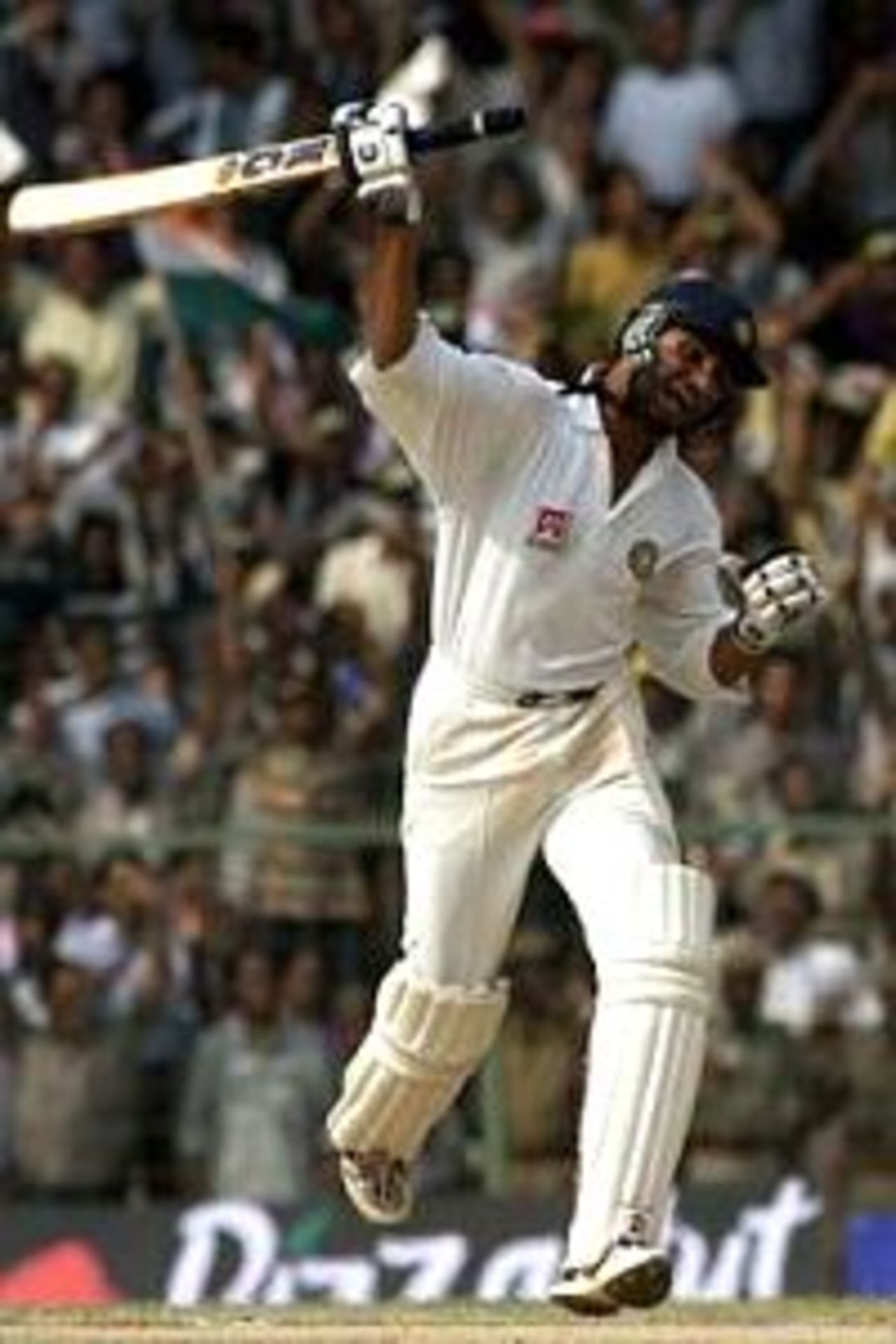 Harbhajan Singh of India celebrates as he completes the winning runs as Glenn McGrath of Australia can't hide his disappoinment, during day five of the third test between India and Australia at the M.A. Chidambaram Stadium, Chennai, India. India won the Test by two wickets and the series 2-1