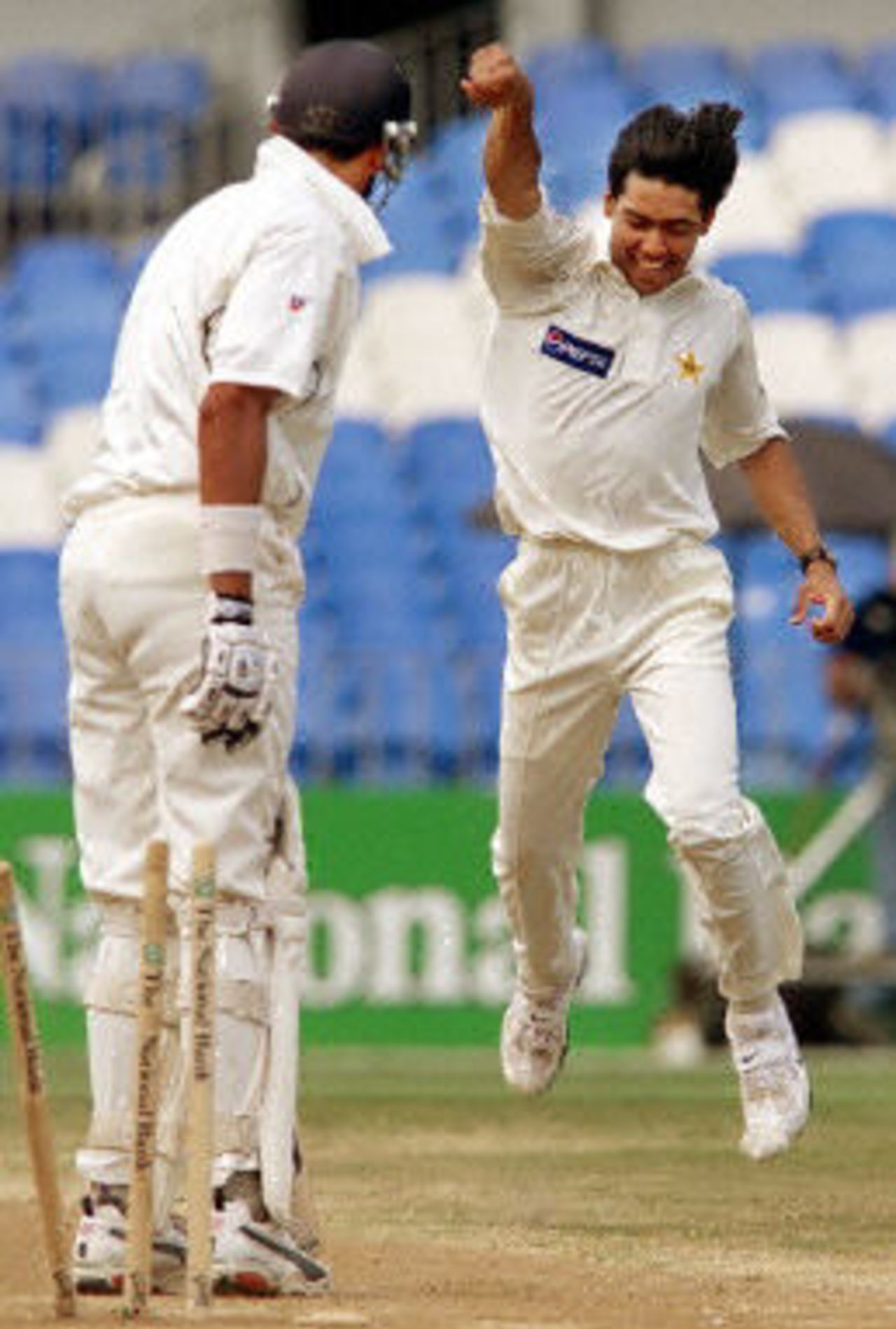 Mohammad Sami clean bowls Daryl Tuffey on the way to capturing five second innings wickets and eight for the match in his test debut, day 5, 1st Test at Eden Park in Auckland, 8-12 March 2001.