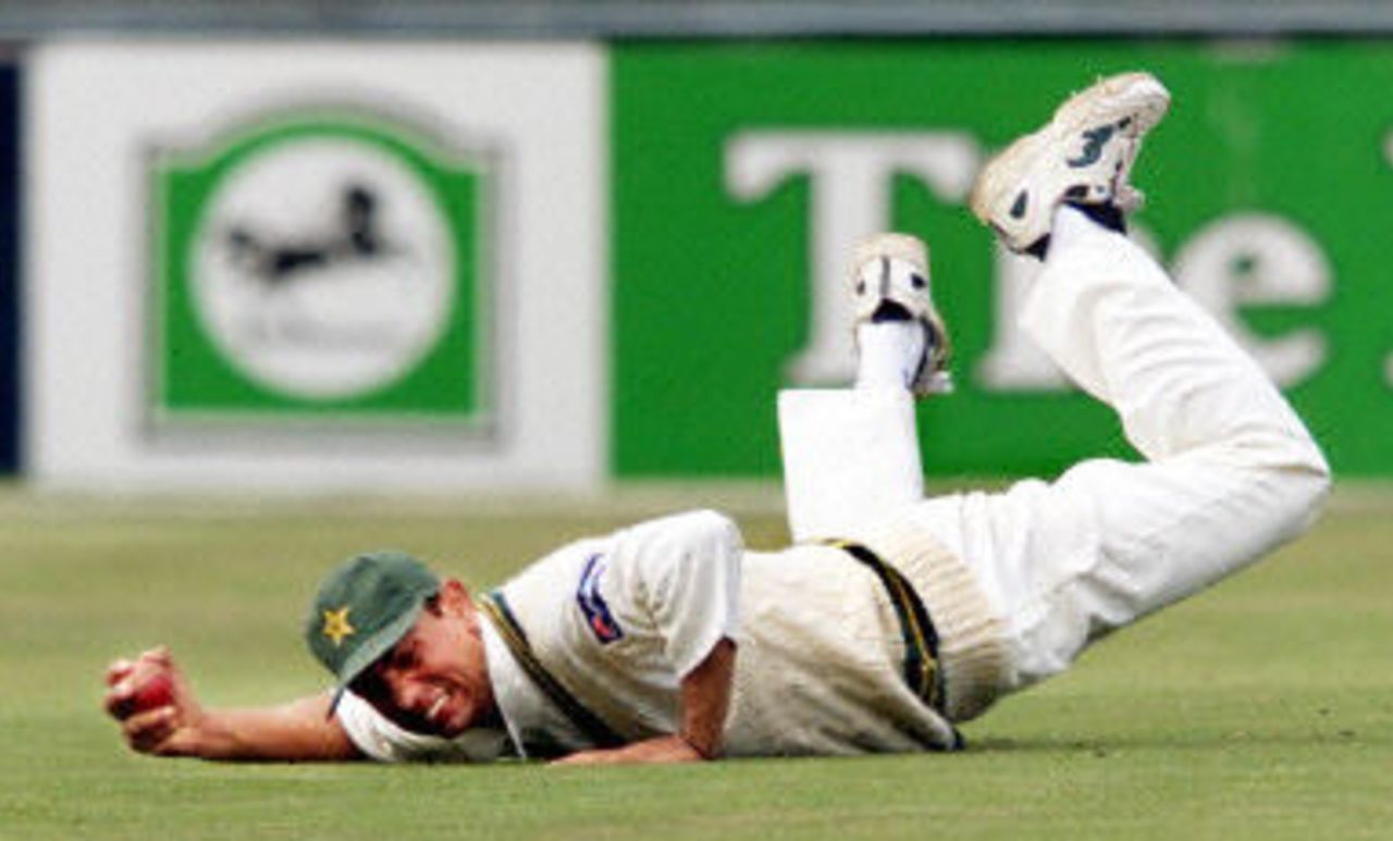 Saqlain Mushtaq dives full length to catch Craig McMillan, day 5, 1st Test at Eden Park in Auckland, 8-12 March 2001.