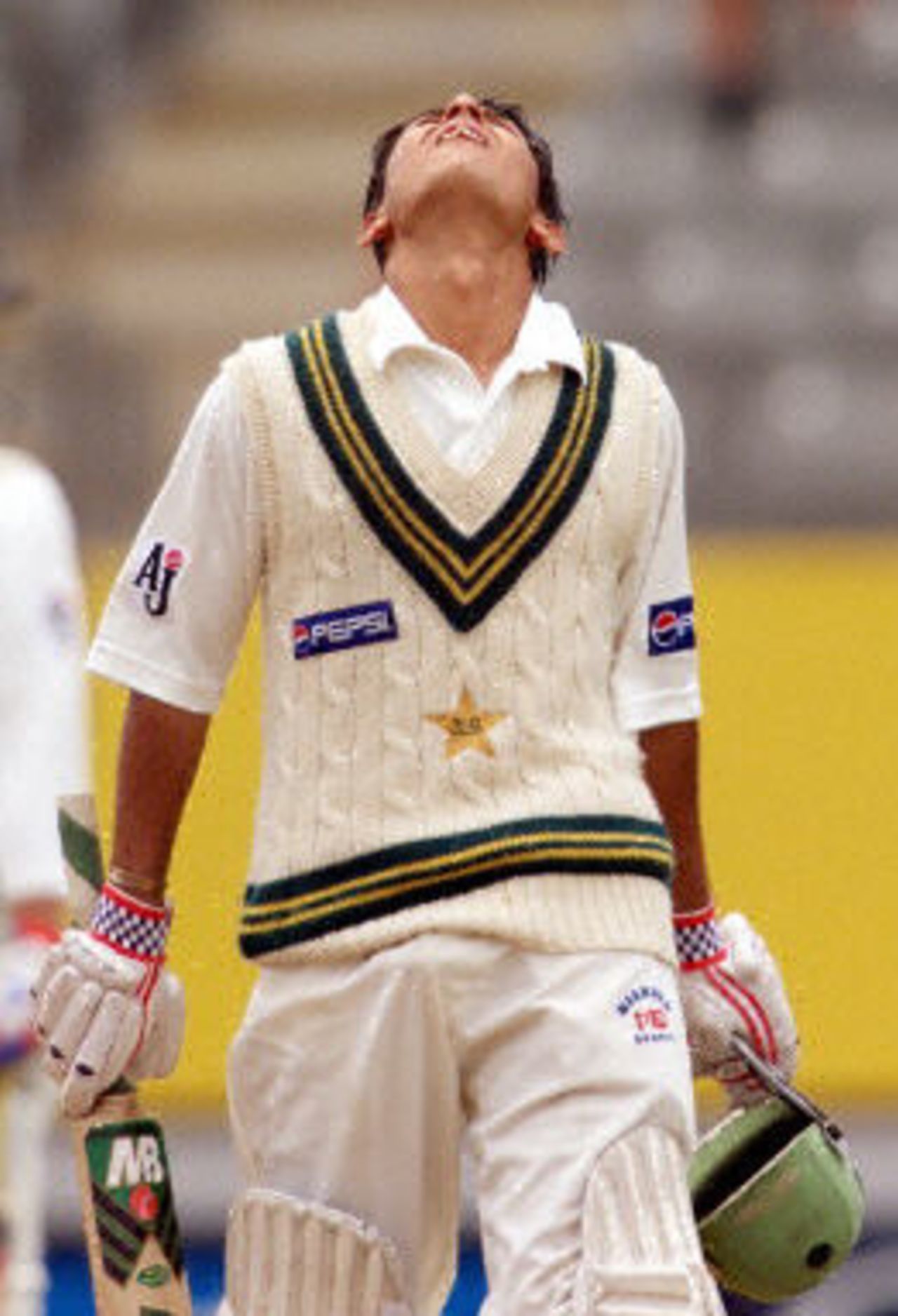 Faisal Iqbal shows relief after scoring his first test half century, day 4, 1st Test at Eden Park in Auckland, 8-12 March 2001.