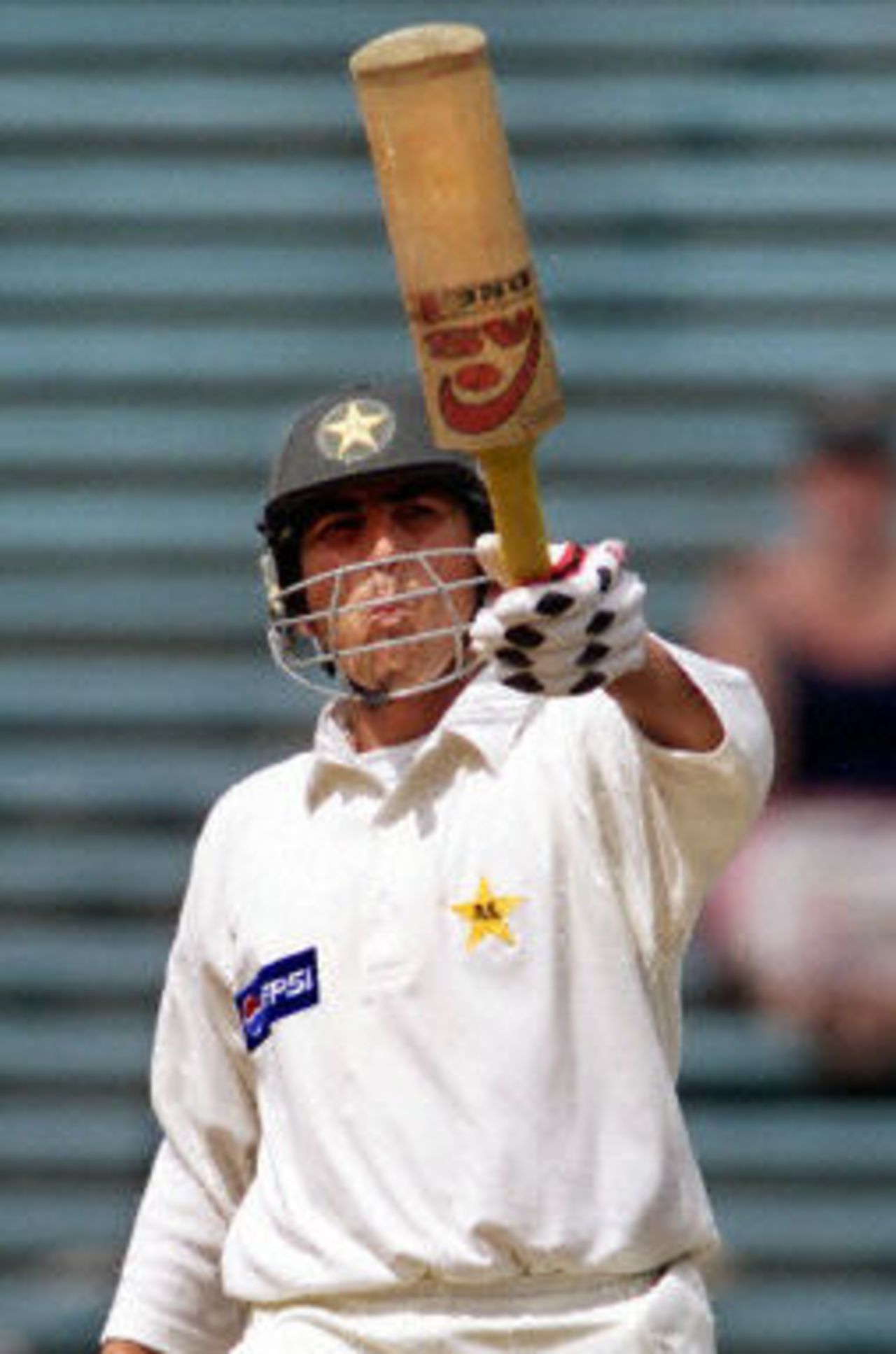 Younis Khan acknowledges the applause after scoring his century, day 4, 1st Test at Eden Park in Auckland, 8-12 March 2001.