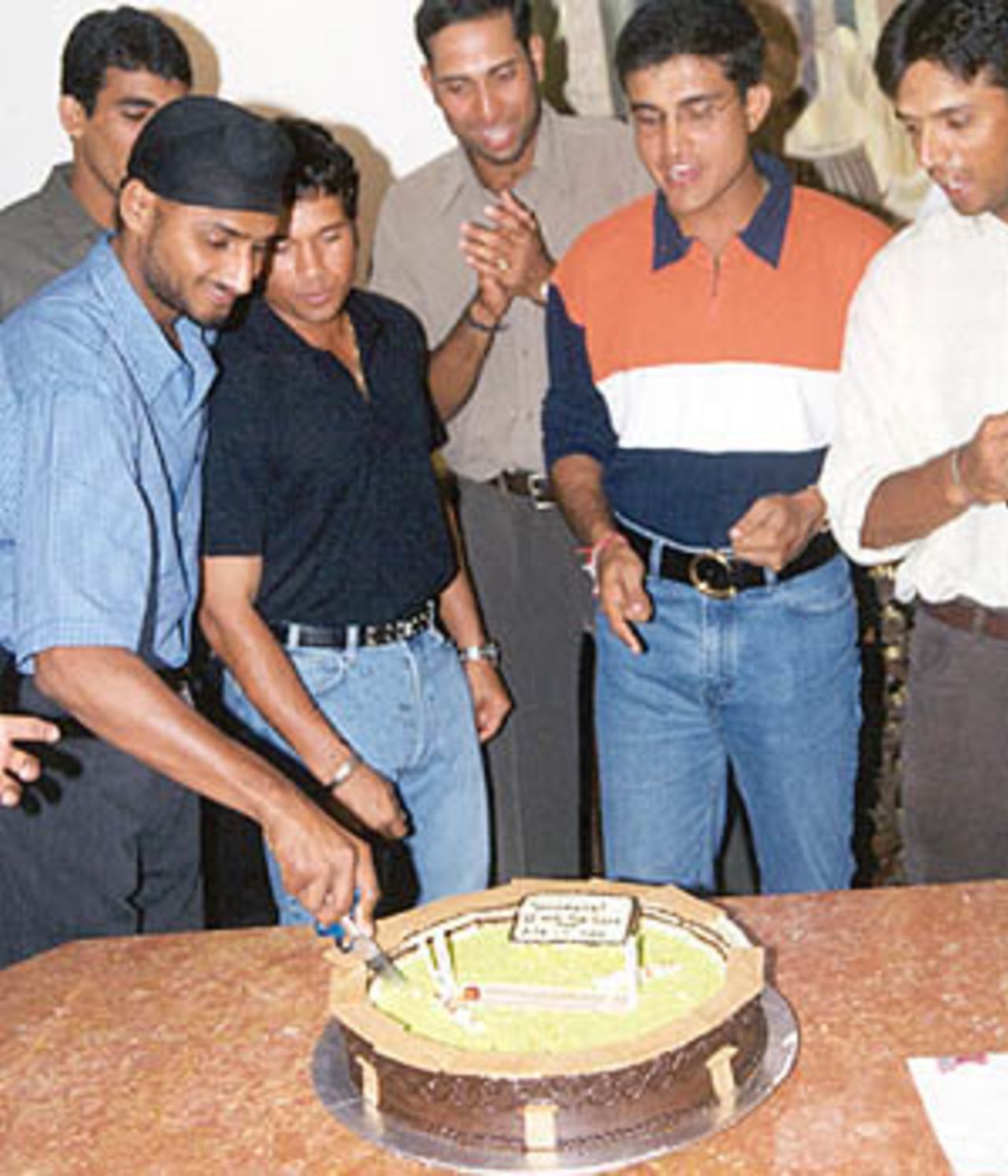 The Indian team celebrate the recovery of the Border-Gavaskar Trophy in style at the Taj Coromandel in Chennai, 22 March 2001.