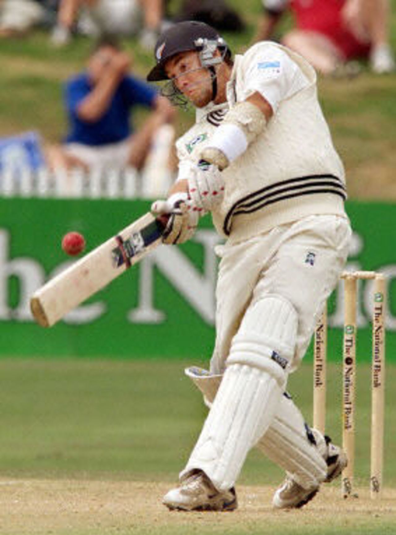 Craig McMillan slams a ball over the boundary, as he goes on a run scoring feast which included a world record 26 runs off an over from bowler Younis Khan, day 4, third Test, Hamilton 30 March 2001.