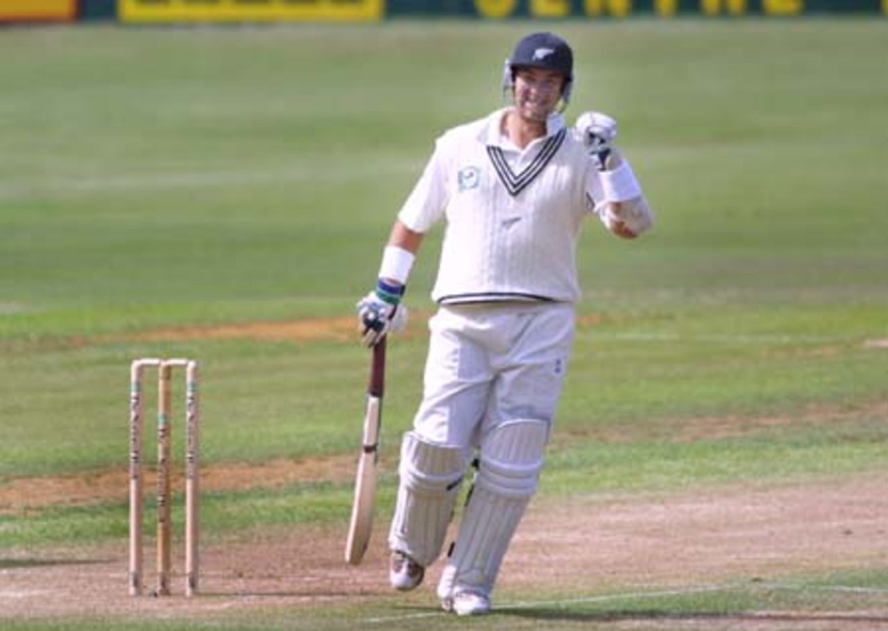 New Zealand batsman Craig McMillan punches the air in celebration of hitting boundaries from every ball of Pakistan leg spinner Younis Khan's only over. He struck 4, 4, 4, 4, 6, 4 for a total of 26 runs, a record for the most runs by a batsman in a Test over. McMillan went on to score 98 in his first innings. 3rd Test: New Zealand v Pakistan at WestpacTrust Park, Hamilton, 27-31 March 2001 (Day 4).