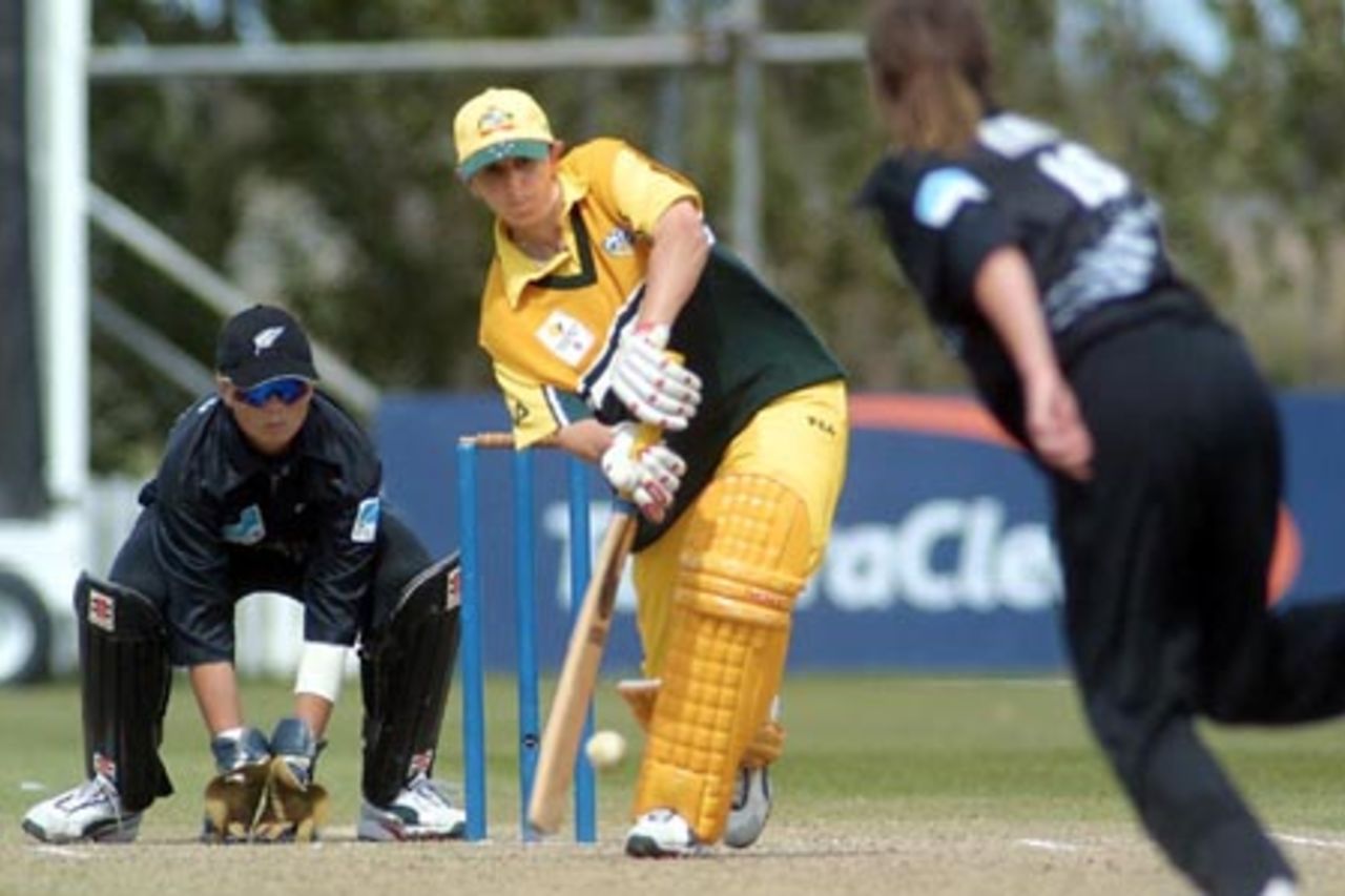 Australia Women batsman Michelle Goszko plays a delivery from New Zealand Women bowler Frances King to the leg side during her innings of 48. Wicket-keeper Rebecca Rolls looks on. 2nd WODI: New Zealand Women v Australia Women at Bert Sutcliffe Oval, Lincoln, 3 March 2002.