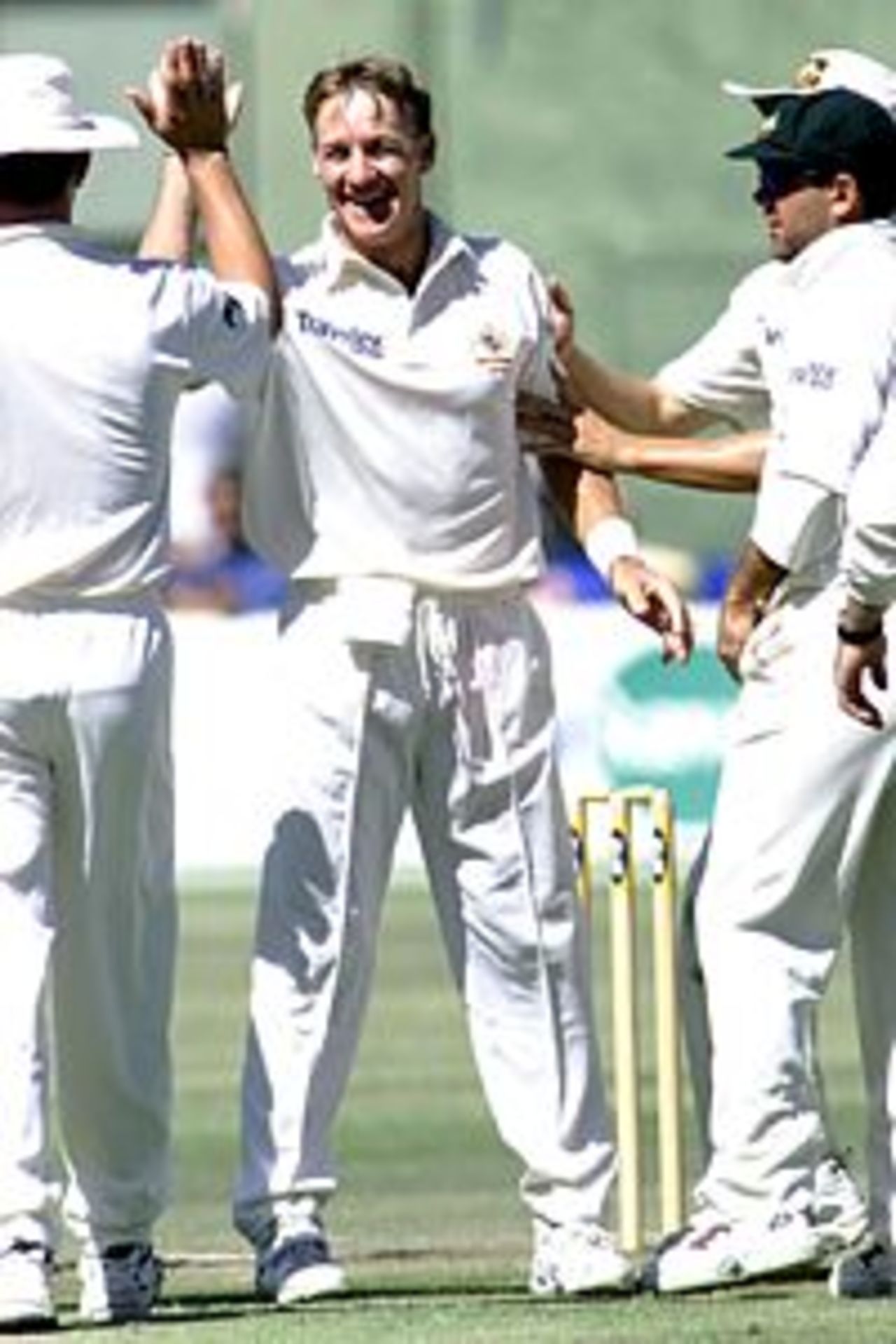3 Mar 2002: Andy Bichel of Australia celebrates getting the wicket of Darryl Cullinan of South Africa for 16 during the South Africa A v Australia match played in Port Elizabeth, South Africa.