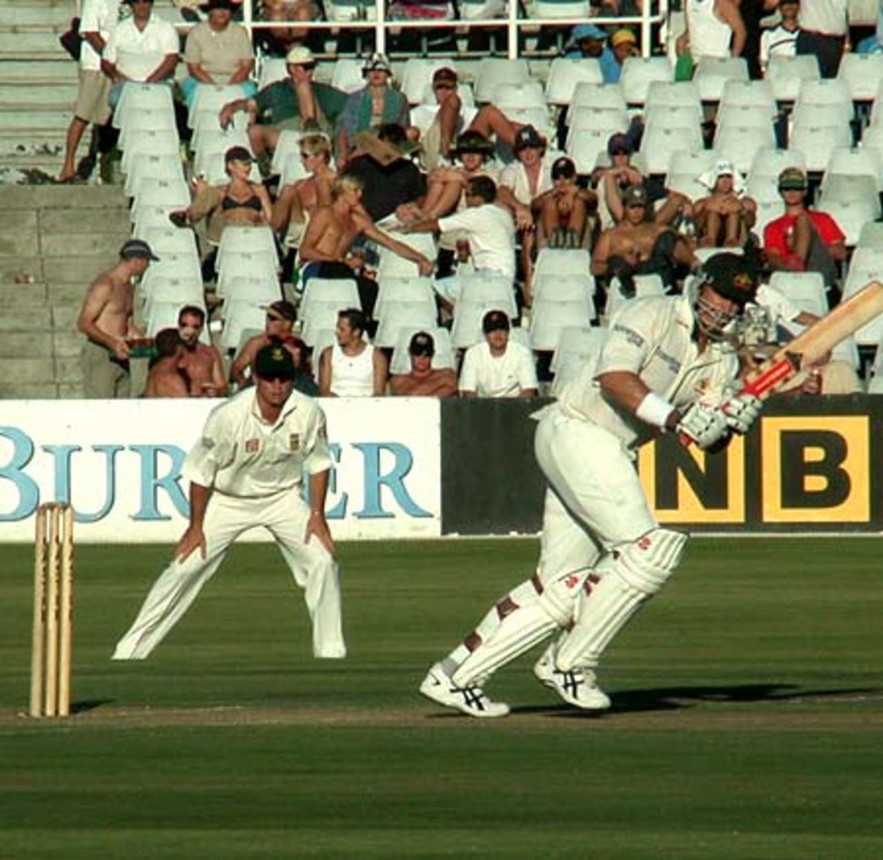 Justin Langer turns a Makhaya Ntini delivery to leg