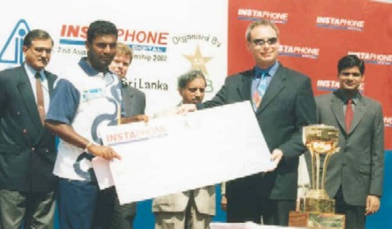 Muralitharan receiving the Best Bowler award at ATC final, Gaddafi Stadium, Lahore,  10 Mar 2002