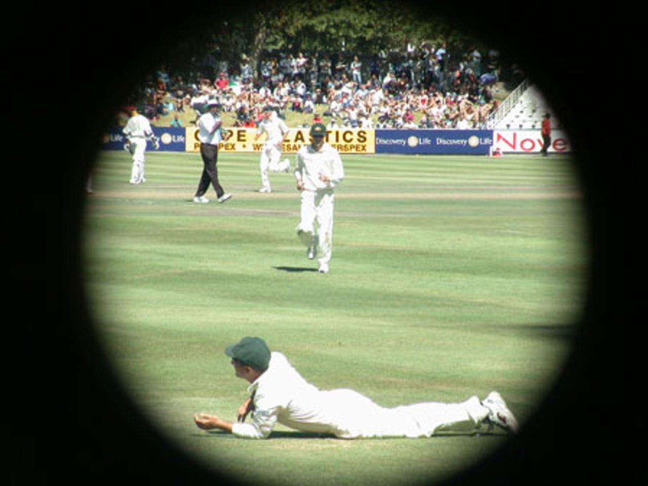 Justin Langer takes a brilliant catch to dismiss Makhaya Ntini on the deep midwicket boundary