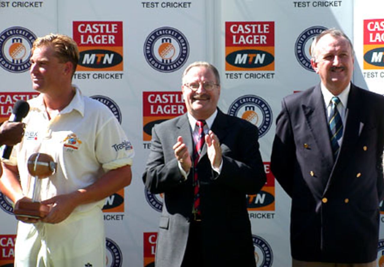 Shane Warne at the after match presentation with Arnold Bloch and Robbie Kurz of the UCB looking on