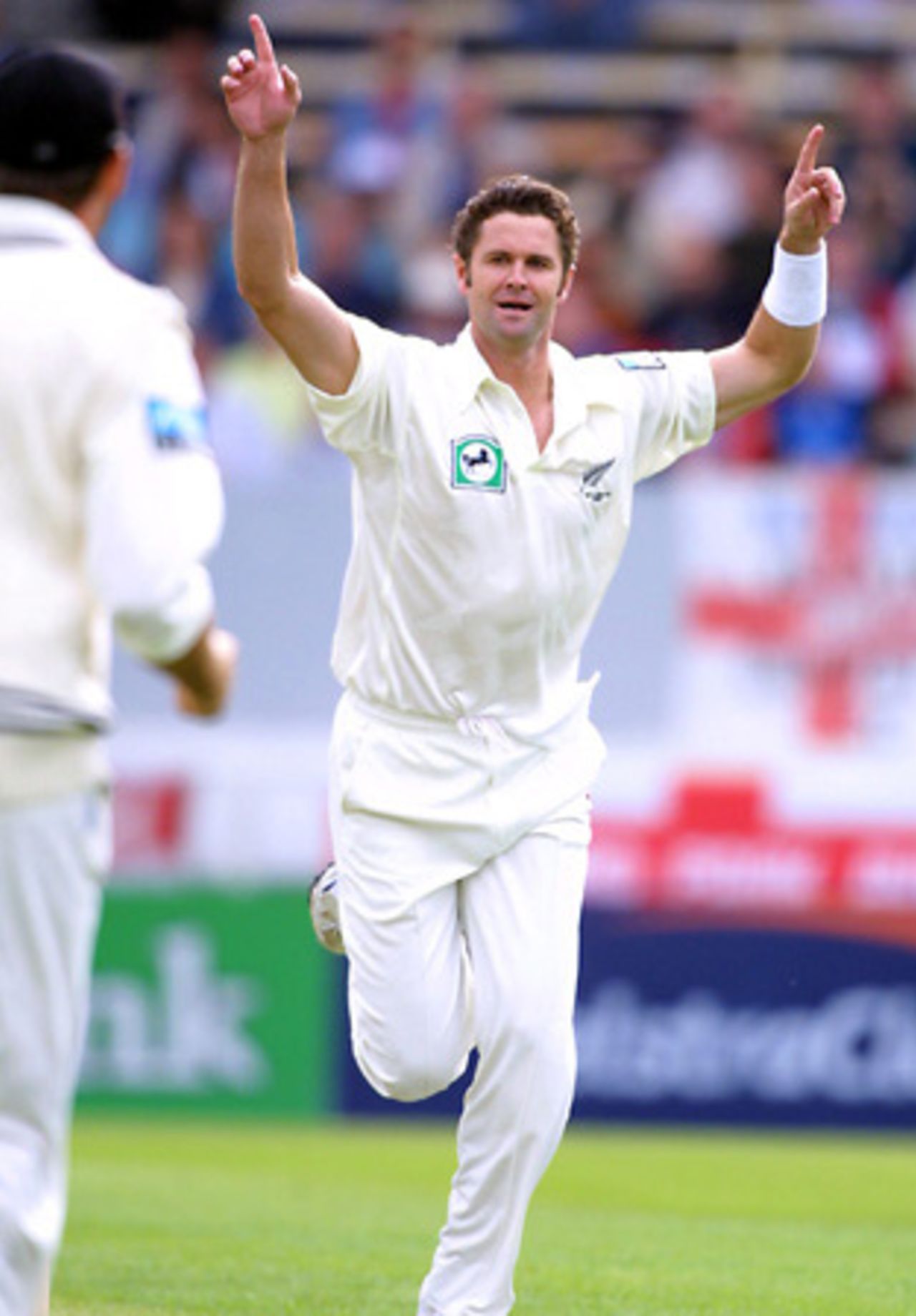 New Zealand bowler Chris Cairns celebrates the dismissal of England batsman Marcus Trescothick, caught by wicket-keeper Adam Parore for 0. 1st Test: New Zealand v England at Jade Stadium, Christchurch, 13-17 March 2002 (13 March 2002).