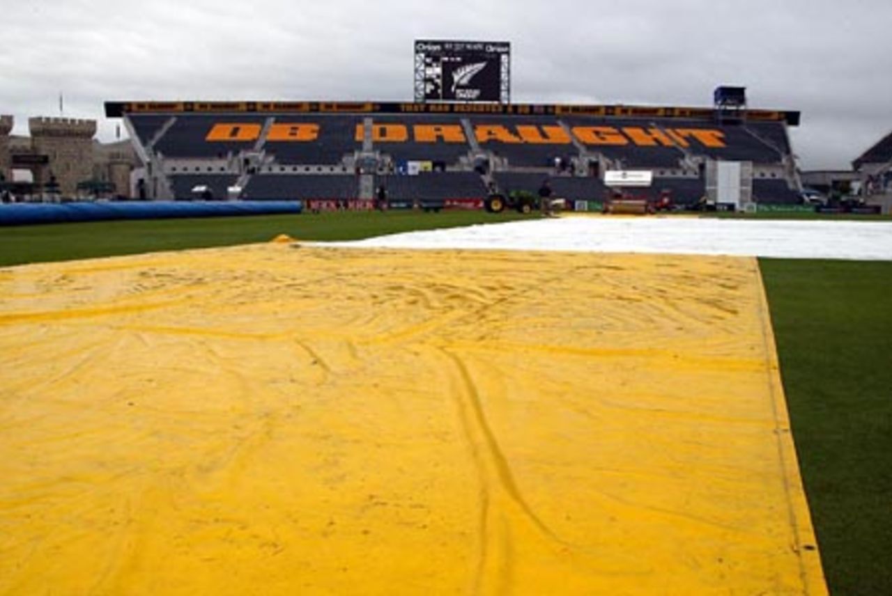 Covers on the pitch as rain delays the start of play on day two. 1st Test: New Zealand v England at Jade Stadium, Christchurch, 13-17 March 2002 (14 March 2002).