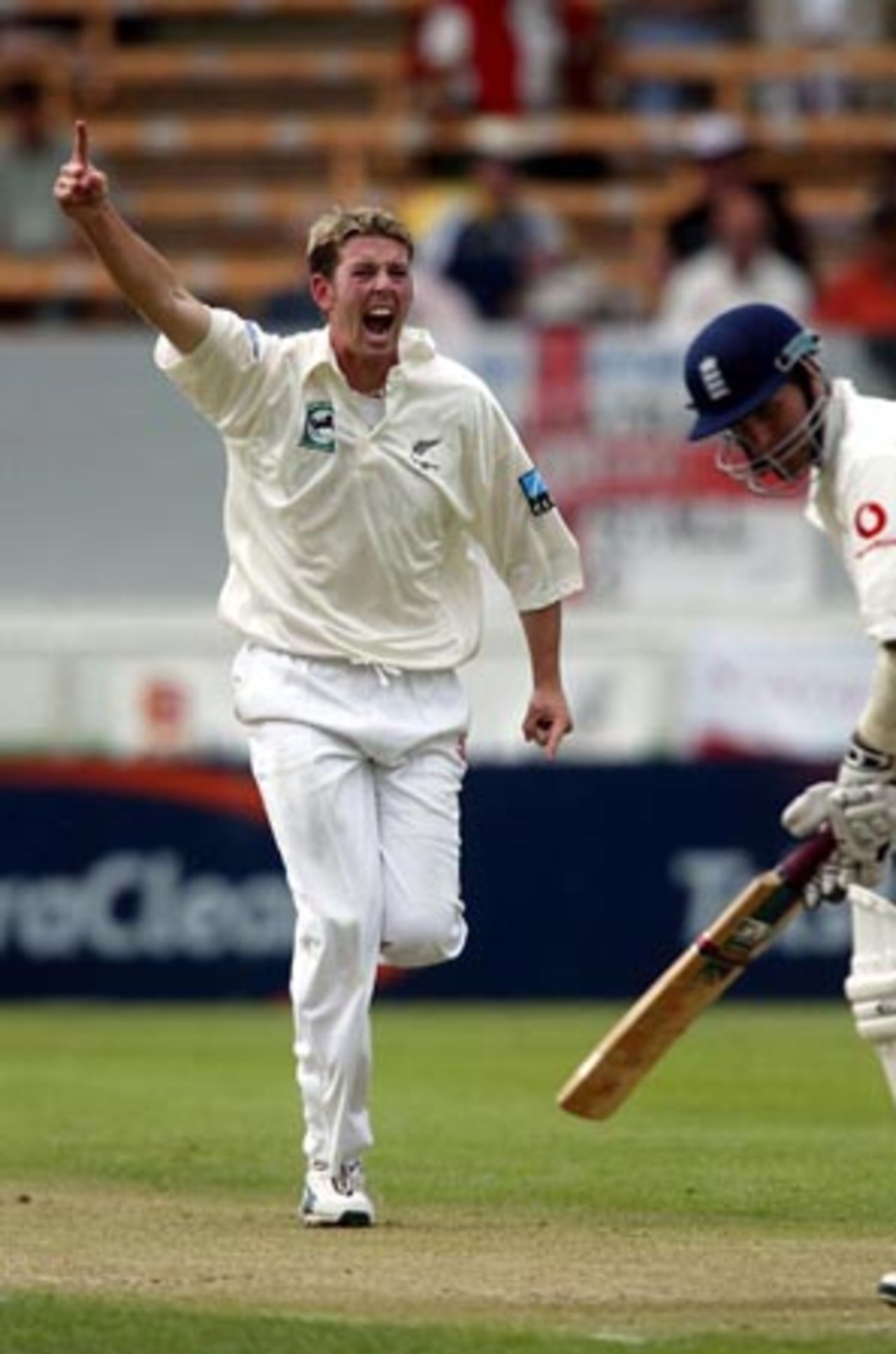 New Zealand bowler Ian Butler celebrates the dismissal of England batsman Michael Vaughan, bowled for 0. 1st Test: New Zealand v England at Jade Stadium, Christchurch, 13-17 March 2002 (14 March 2002).