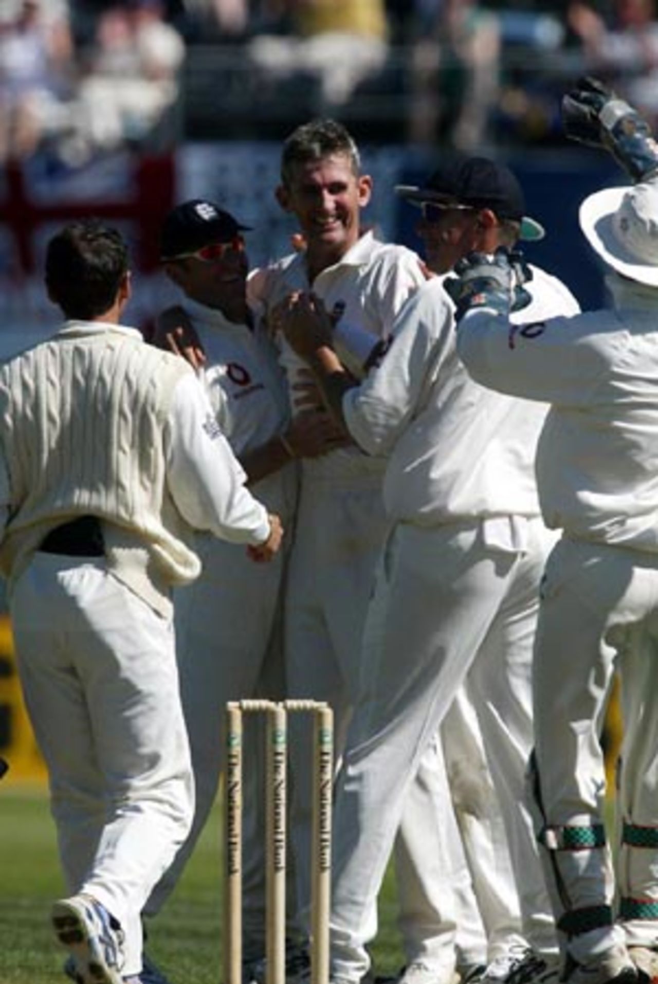 England bowler Andy Caddick is congratulated by team-mates after dismissing New Zealand batsman Adam Parore, lbw for 0 in his first innings. From left, Mark Ramprakash, Mark Butcher, Caddick, Ashley Giles and James Foster. 1st Test: New Zealand v England at Jade Stadium, Christchurch, 13-17 March 2002 (14 March 2002).