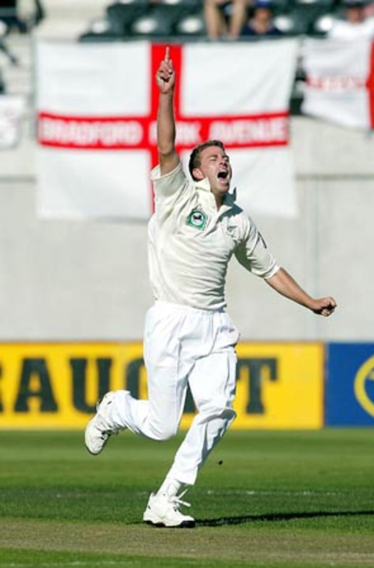 New Zealand bowler Chris Drum celebrates the dismissal of England batsman Nasser Hussain, caught by wicket-keeper Adam Parore in his second innings for 11. 1st Test: New Zealand v England at Jade Stadium, Christchurch, 13-17 March 2002 (15 March 2002).