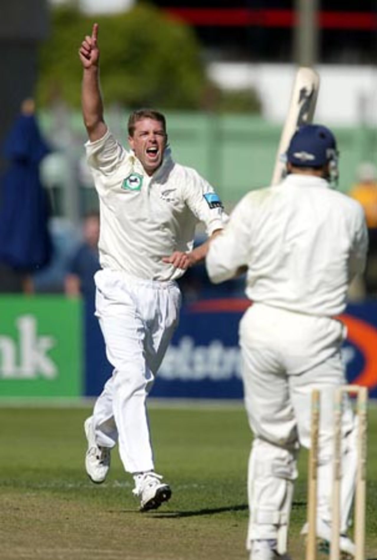 New Zealand bowler Chris Drum celebrates the dismissal of England batsman Mark Ramprakash, bowled in his second innings for 11. 1st Test: New Zealand v England at Jade Stadium, Christchurch, 13-17 March 2002 (15 March 2002).