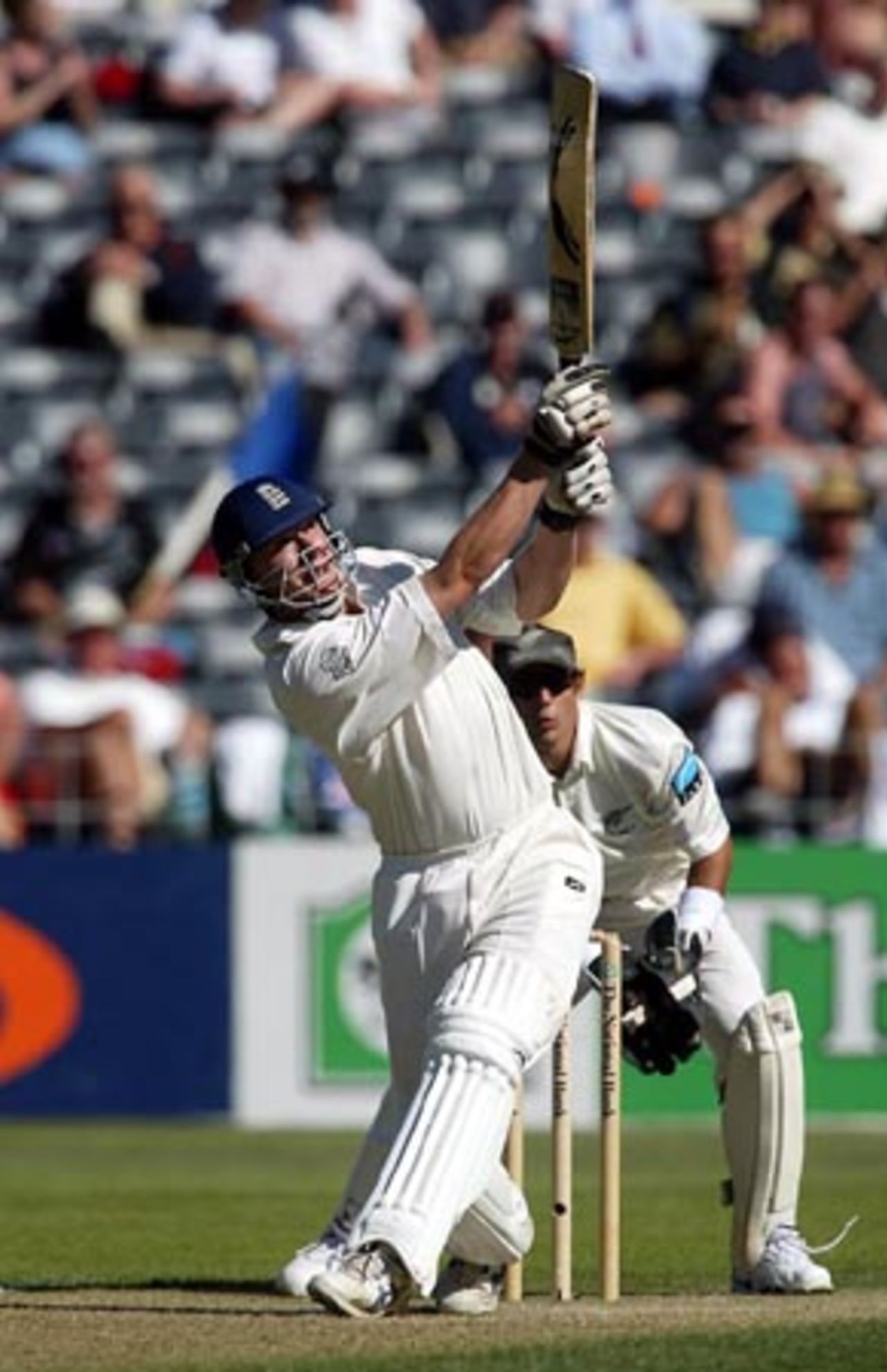 England batsman Andrew Flintoff lofts a six over midwicket from New Zealand bowler Daniel Vettori during his second innings of 137. 1st Test: New Zealand v England at Jade Stadium, Christchurch, 13-17 March 2002 (15 March 2002).