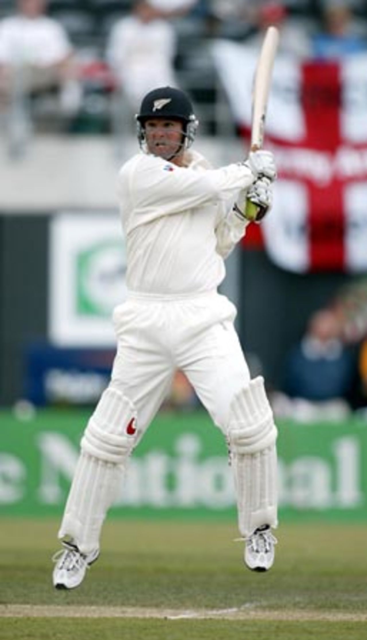 New Zealand batsman Nathan Astle cuts a delivery during his second innings of 222. 1st Test: New Zealand v England at Jade Stadium, Christchurch, 13-17 March 2002 (16 March 2002).