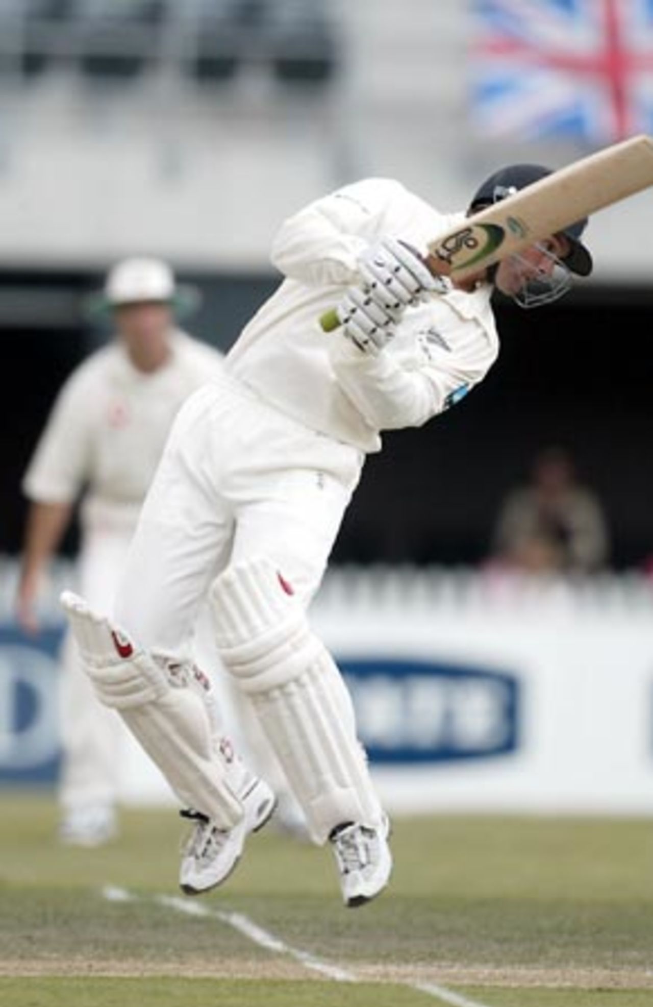 New Zealand batsman Nathan Astle jumps to hook a short delivery from England bowler Matthew Hoggard to the boundary during his second innings of 222. 1st Test: New Zealand v England at Jade Stadium, Christchurch, 13-17 March 2002 (16 March 2002).