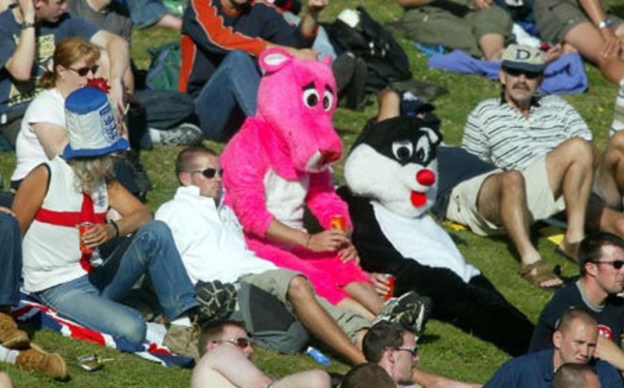 A couple of costumed fans on the terraces watch play on the second day at the Basin Reserve. 2nd Test: New Zealand v England at Basin Reserve, Wellington, 21-25 March 2002 (22 March 2002).