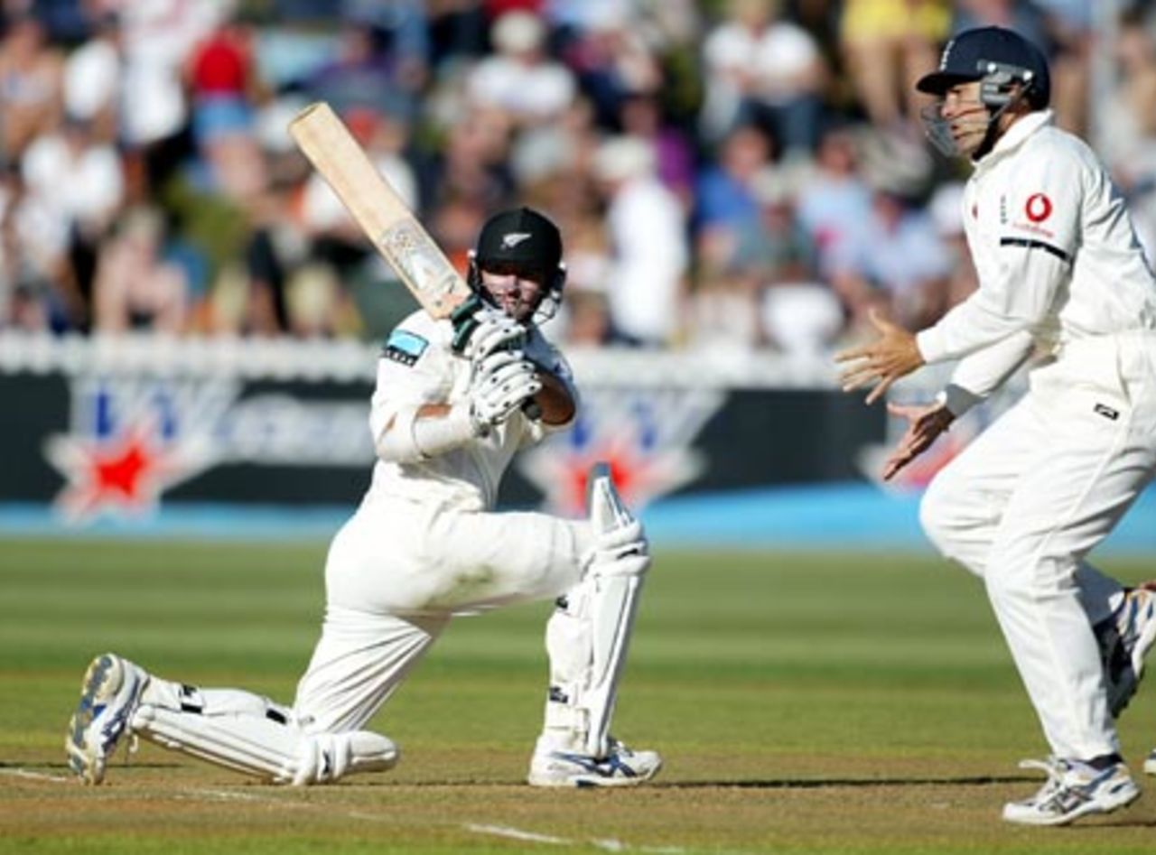 New Zealand batsman Mark Richardson sweeps a delivery from England bowler Ashley Giles as short leg fielder Mark Ramprakash jumps to avoid it. Richardson ended the third day's play on 29 not out. 2nd Test: New Zealand v England at Basin Reserve, Wellington, 21-25 March 2002 (22 March 2002).