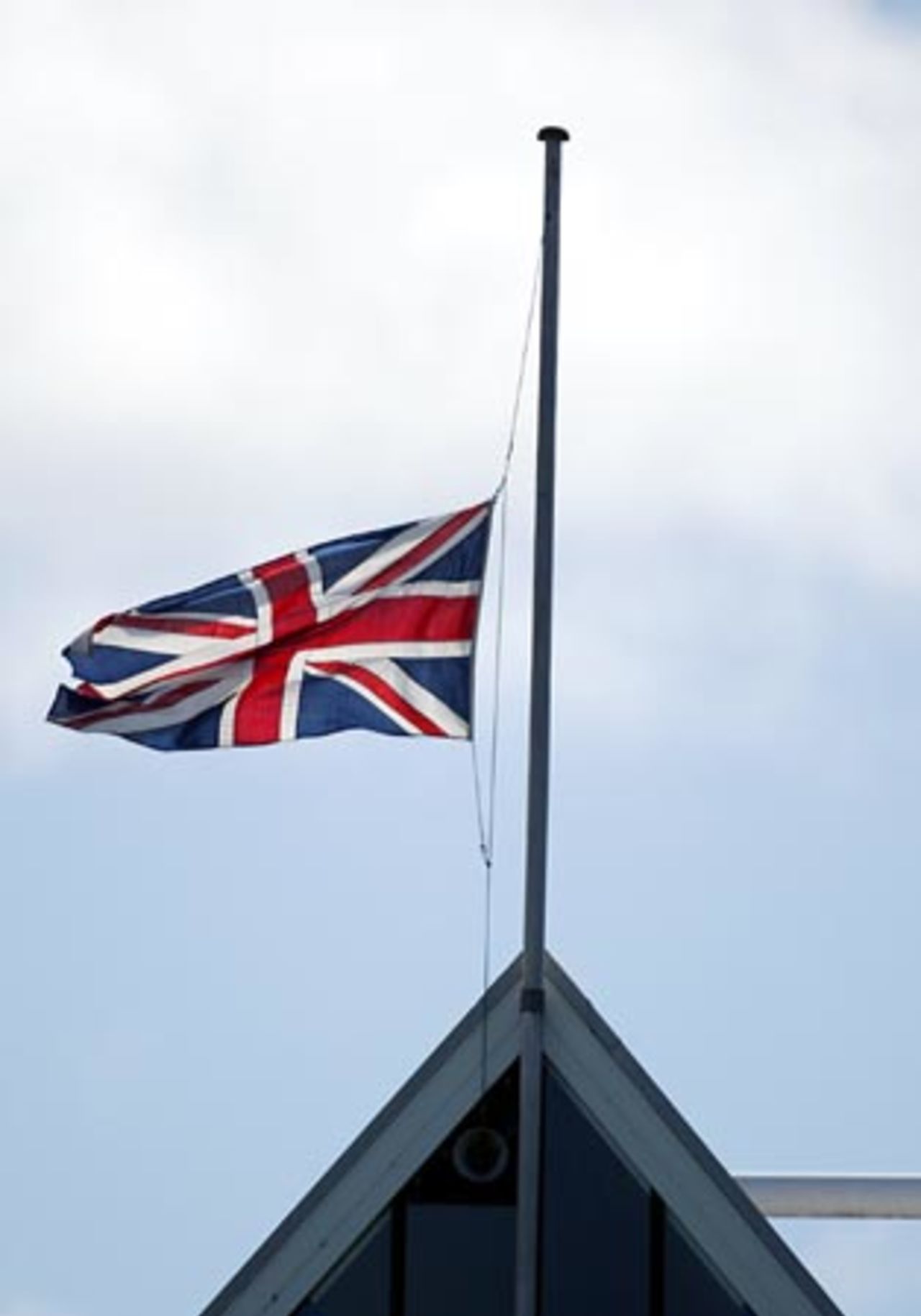 The Union Jack flag flies at half-mast to mourn the death of England player Ben Hollioake, killed in a car crash in Perth, Australia overnight. Hollioake was a member of England's One-Day International squad for the series in New Zealand which ended one month ago. He was 24 years old. 2nd Test: New Zealand v England at Basin Reserve, Wellington, 21-25 March 2002 (22 March 2002).