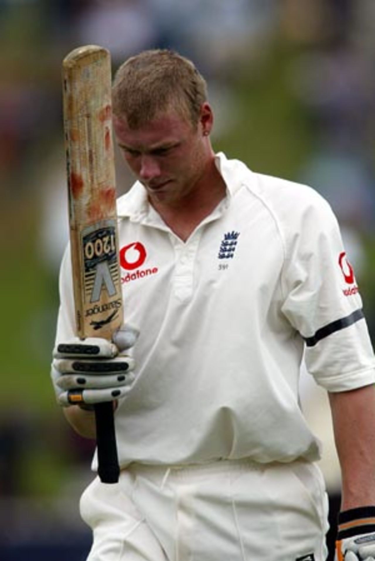 England batsman Andrew Flintoff raises his bat to acknowledge the crowd after being dismissed for 75 in his second innings. 2nd Test: New Zealand v England at Basin Reserve, Wellington, 21-25 March 2002 (25 March 2002).