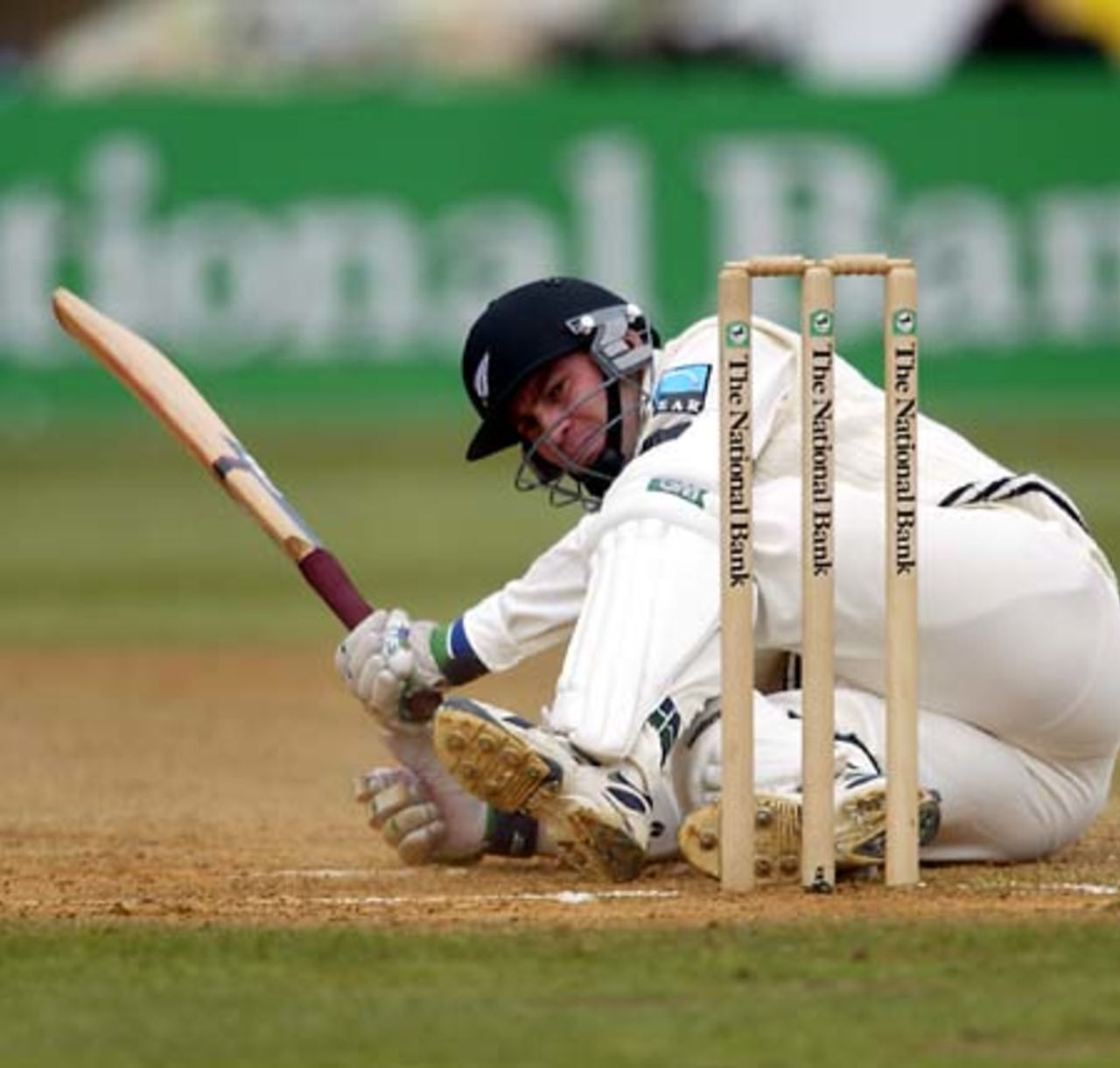 New Zealand batsman Matt Horne falls over after being struck on the pads by a delivery from England bowler Andy Caddick during his second innings of 38. 2nd Test: New Zealand v England at Basin Reserve, Wellington, 21-25 March 2002 (25 March 2002).