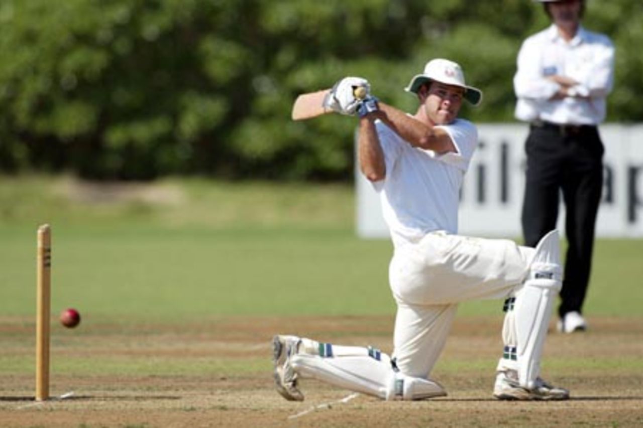 Auckland batsman Tim McIntosh pulls a delivery on bended knee during his first innings of 68. State Championship: Auckland v Wellington at Colin Maiden Park, Auckland, 24-27 March 2002 (26 March 2002).