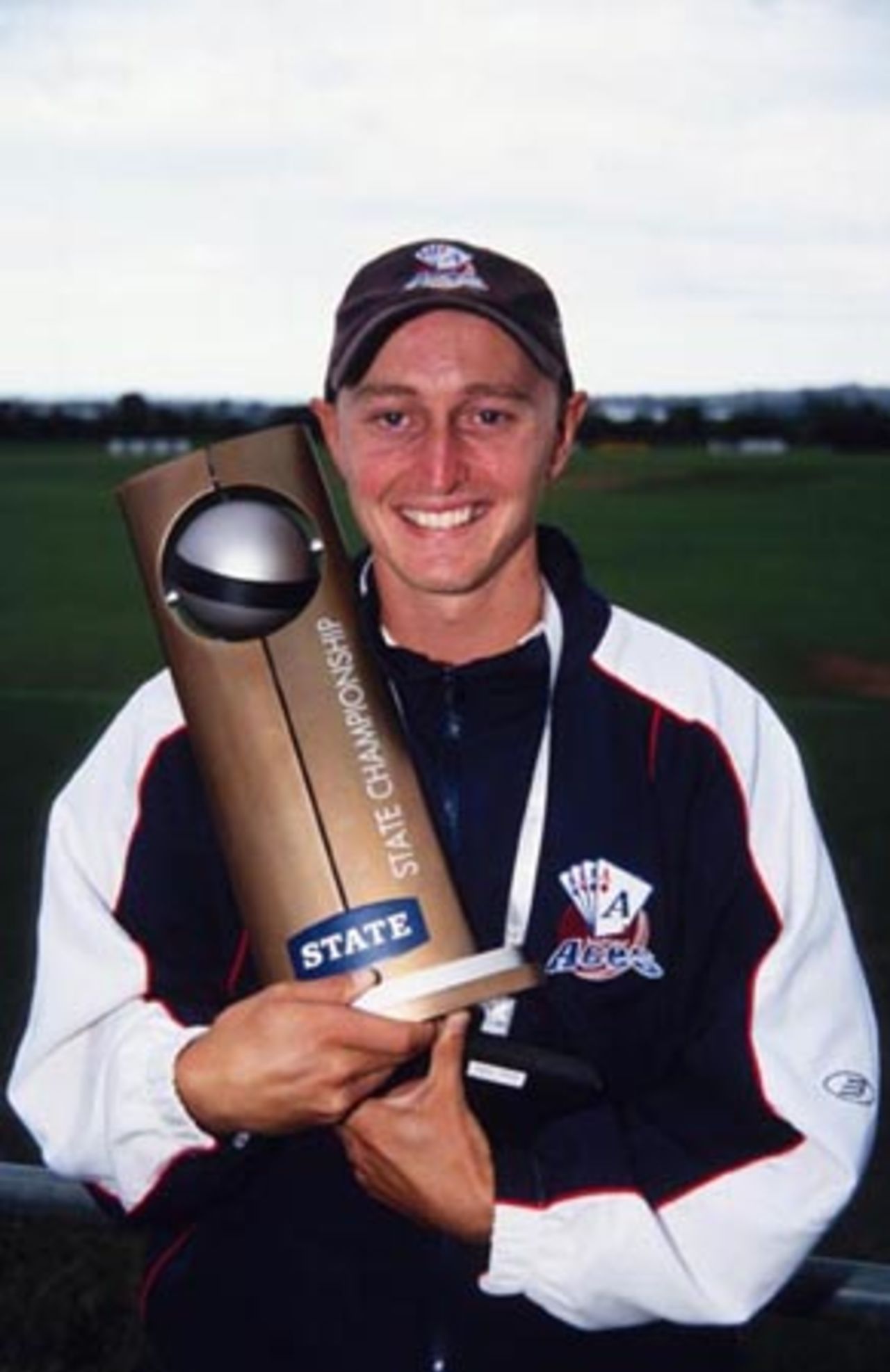 Auckland captain Brooke Walker with the State Championship trophy. State Championship: Auckland v Wellington at Colin Maiden Park, Auckland, 24-27 March 2002 (27 March 2002).