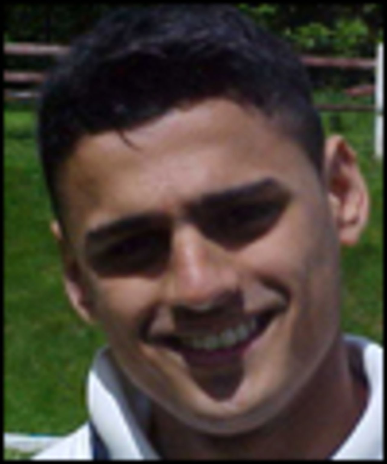 A portrait of Quasim Ali