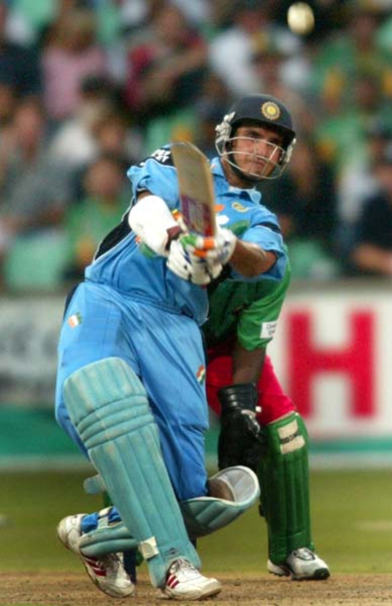 Sourav Ganguly hits a shot as Kenya's wicketkeeper Kennedy Obuya looks on, World Cup 2003, 2nd Semi Final - India v Kenya at Durban, 20 March 2003