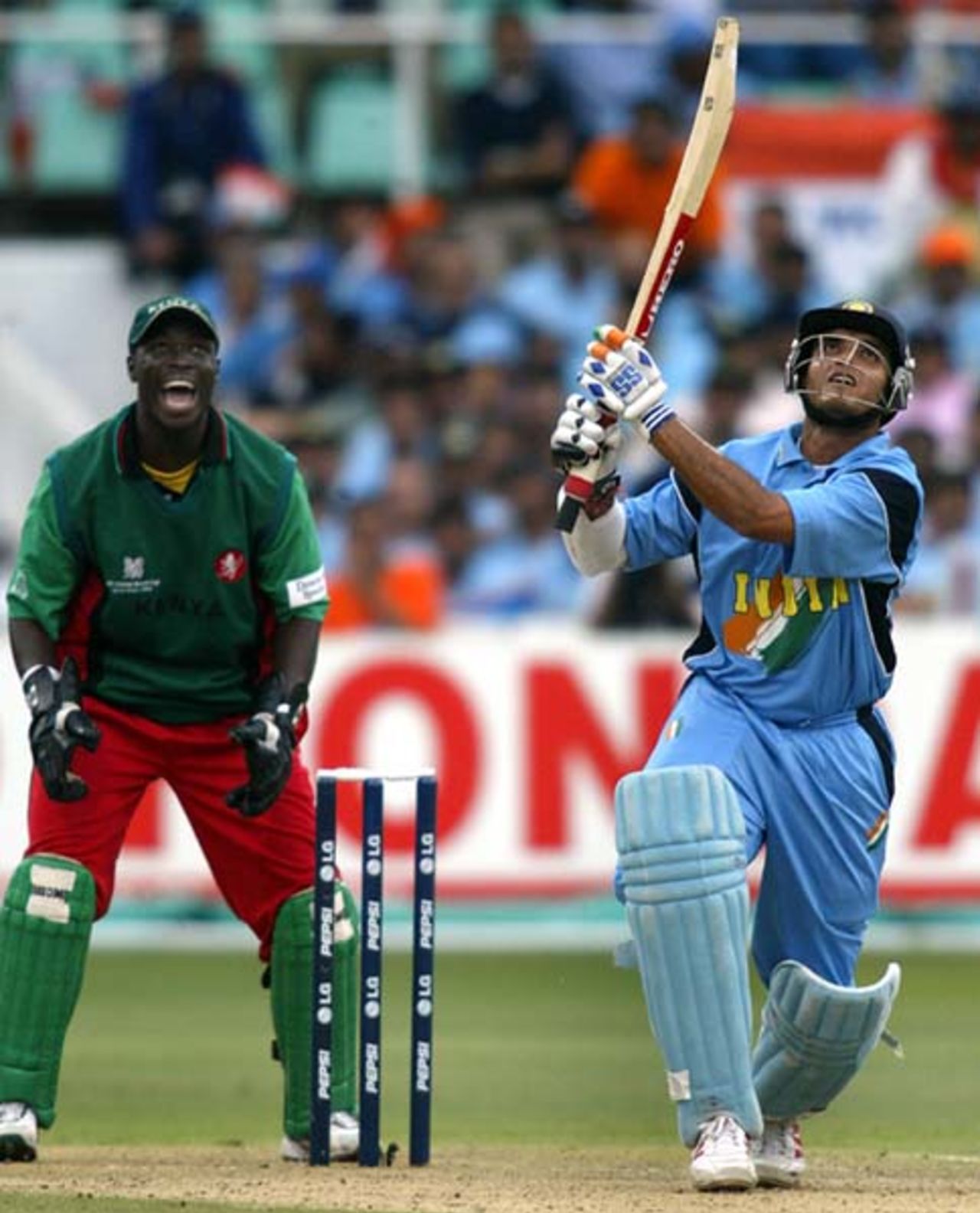Sourav Ganguly hits a shot as Kenya's wicketkeeper Kennedy Obuya looks on, World Cup 2003, 2nd Semi Final - India v Kenya at Durban, 20 March 2003