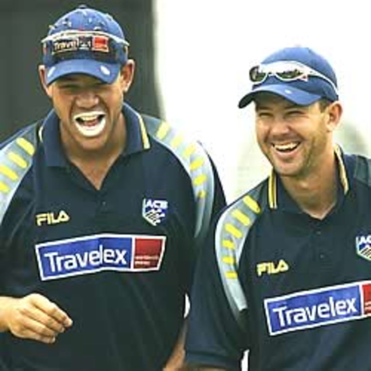 JOHANNESBURG- MARCH 21: Andrew Symonds (L) and Ricky Ponting of Australia share a joke during training at the Wanderers, Johannesburg, South Africa, on March 21, 2003.
