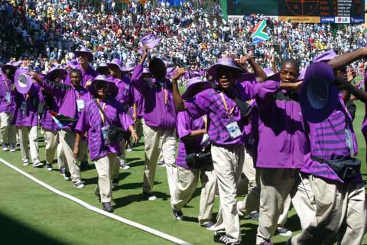 Volunteers parade around The Wanderers, in Johannesburg, South Africa on March 23, 2003.