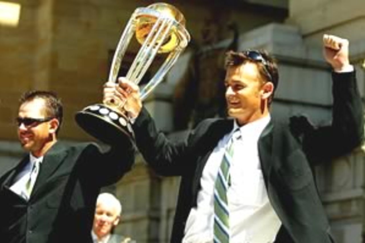 PERTH - MARCH 25: Ricky Ponting and Adam Gilchrist hold up the World Cup trophy during the Public Reception for the Australian Cricket team returning home from winning the ICC 2003 Cricket World Cup at Forest Place in Perth, Australia on March 25, 2003.