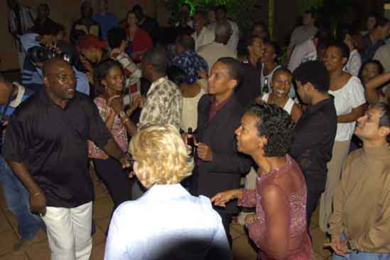 Chris Dehring, head of the Windies World Cup 2007 delegation, among the crowd enjoying the Caribbean rhythms at the party.