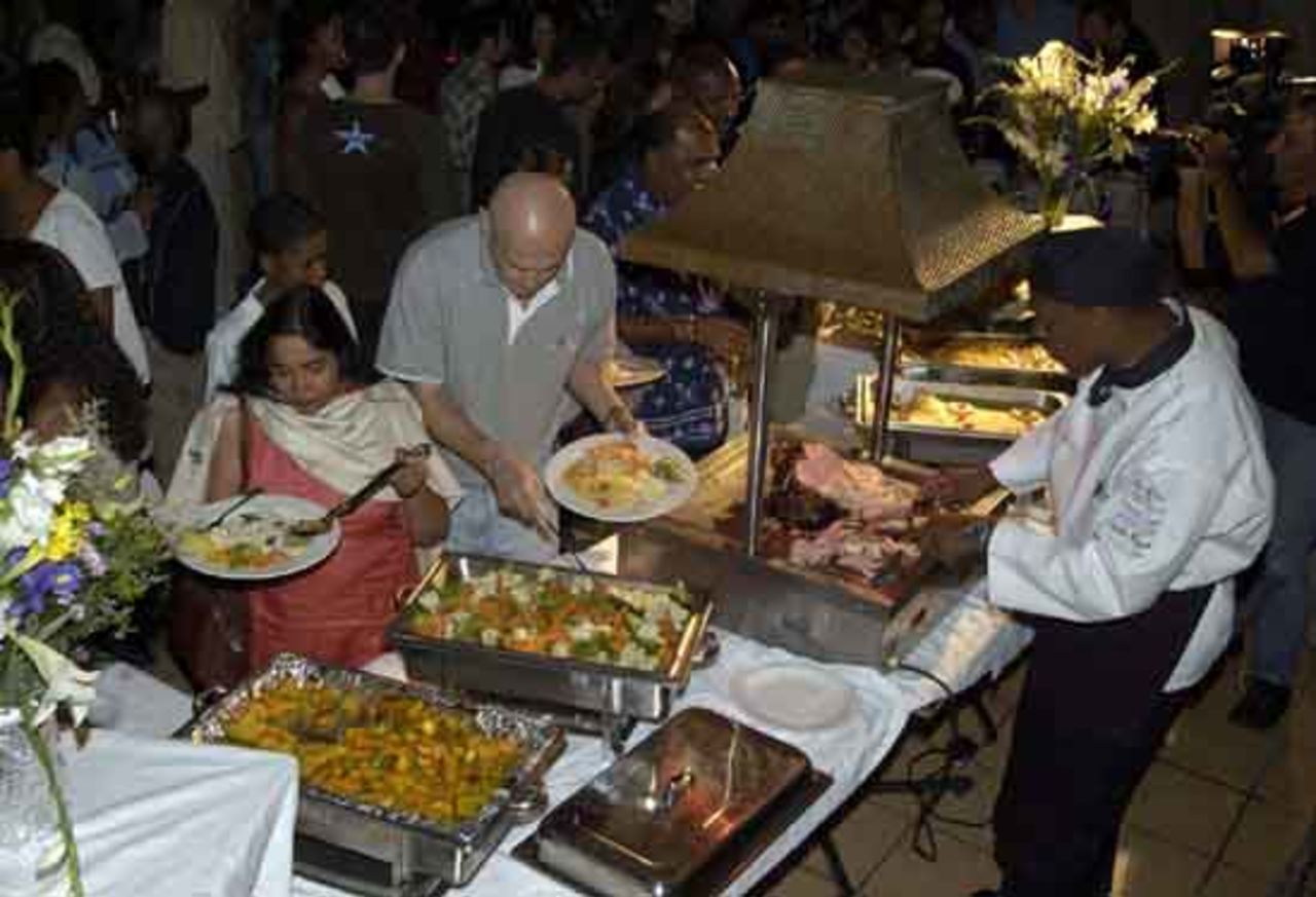 Chef Athlone McCollin of the Elegant Hotels Group presides over the exotic Caribbean buffet at the Windies World Cup 2007 party.