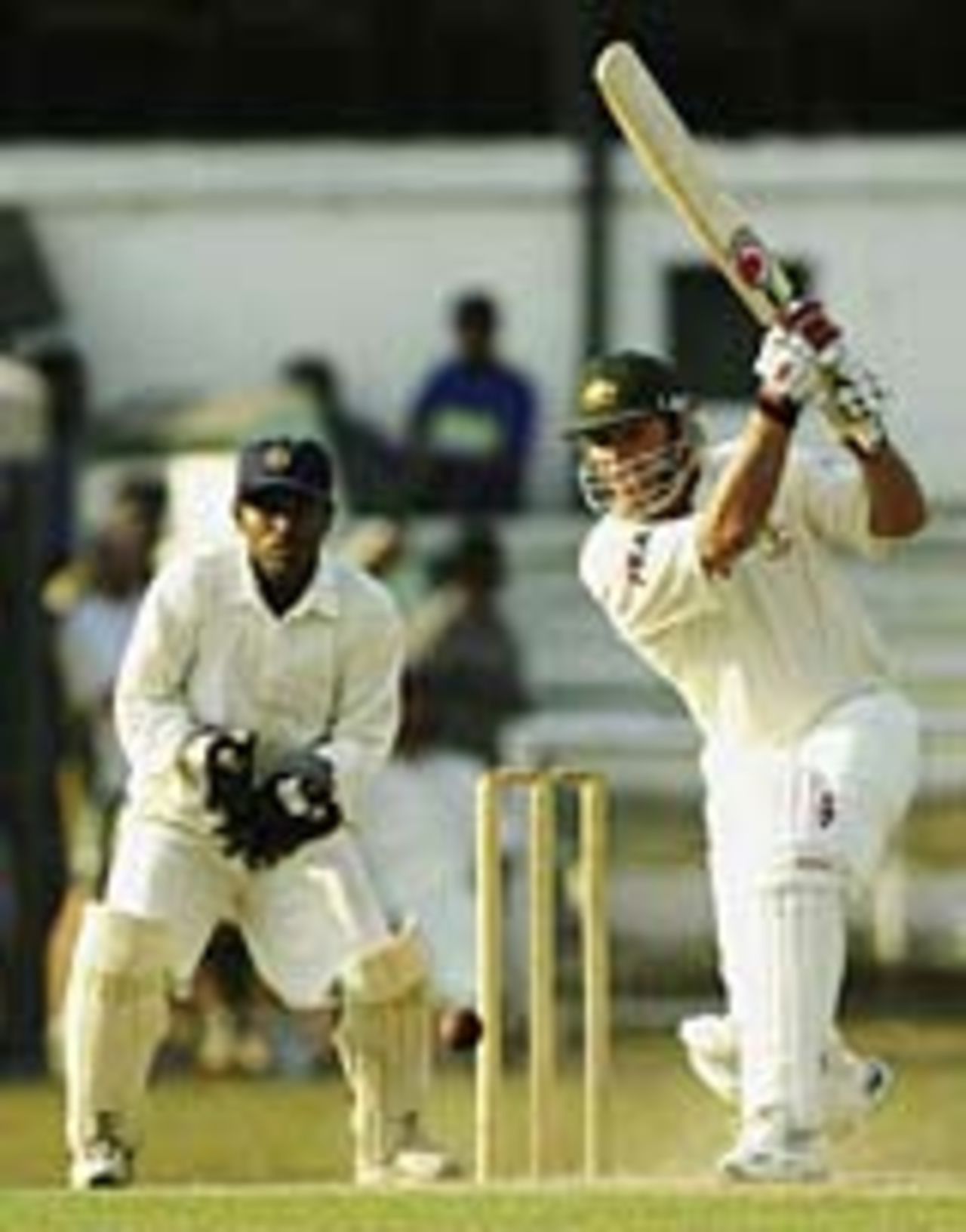 Shane Warne drives, SLC President's XI v Australians, Colombo, March 2, 2004