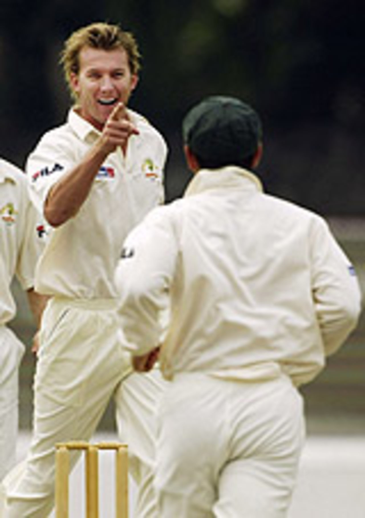 Brett Lee celebrates Russell Arnold's downfall, SLC President's XI v Australians, Colombo, March 3, 2004