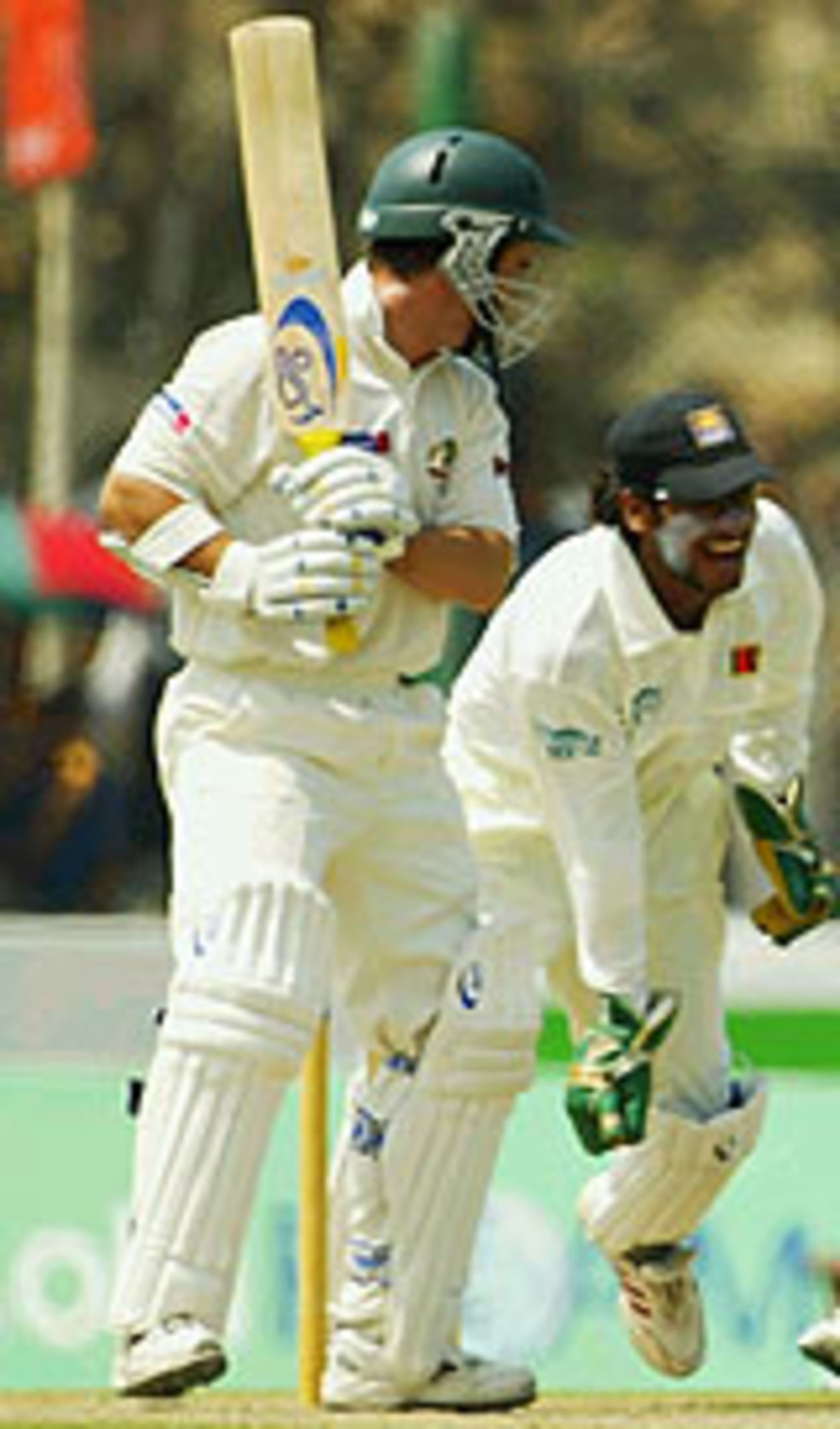 Kumar Sangakkara celebrates as Justin Langer is out, caught behind, Sri Lanka v Australia, 1st Test, Galle, 1st day, March 8, 2004