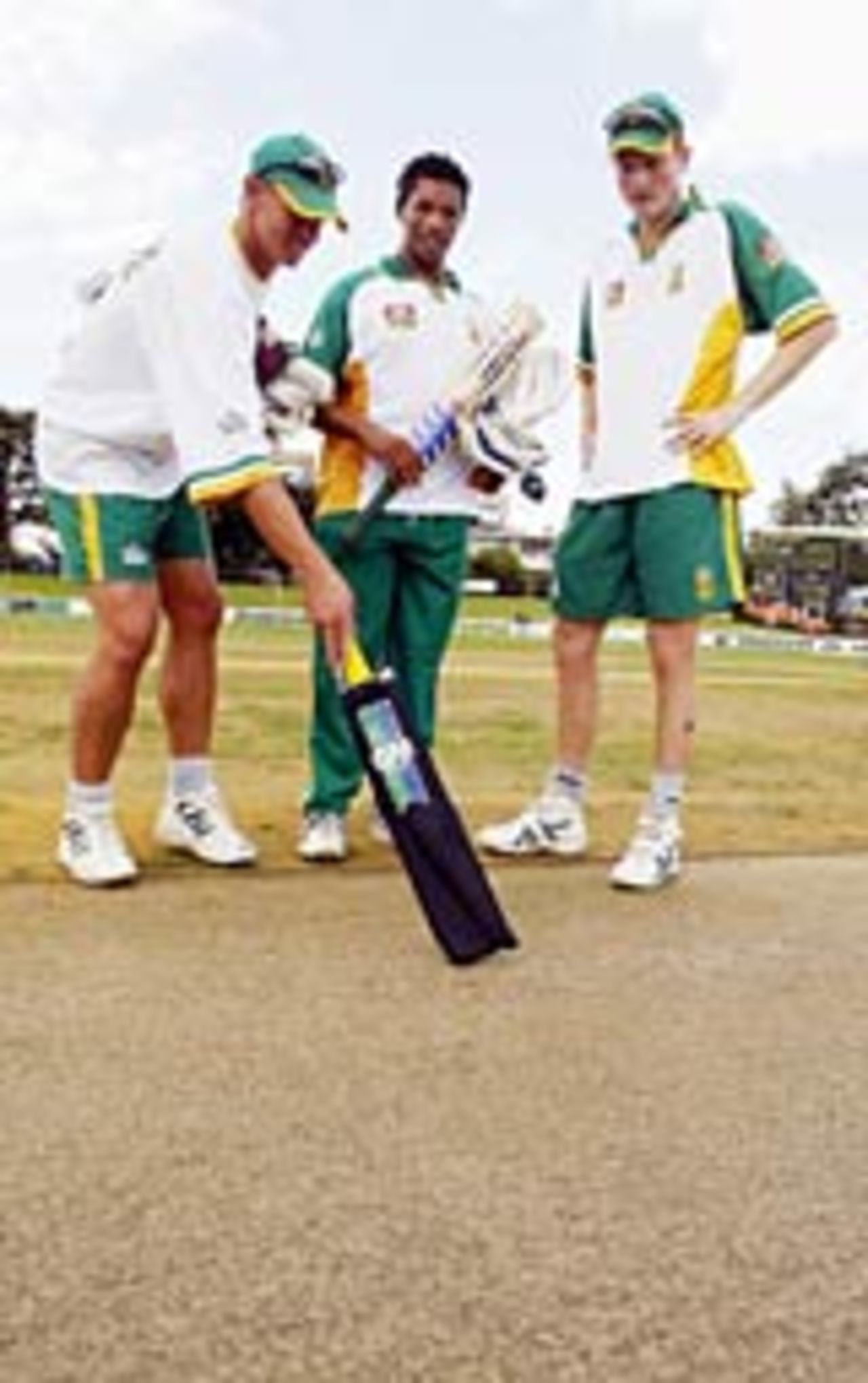 Andre Nel, Makhaya Ntini and David Terbrugge inspect the pitch ahead of the first Test, Hamilton, March 9, 2004